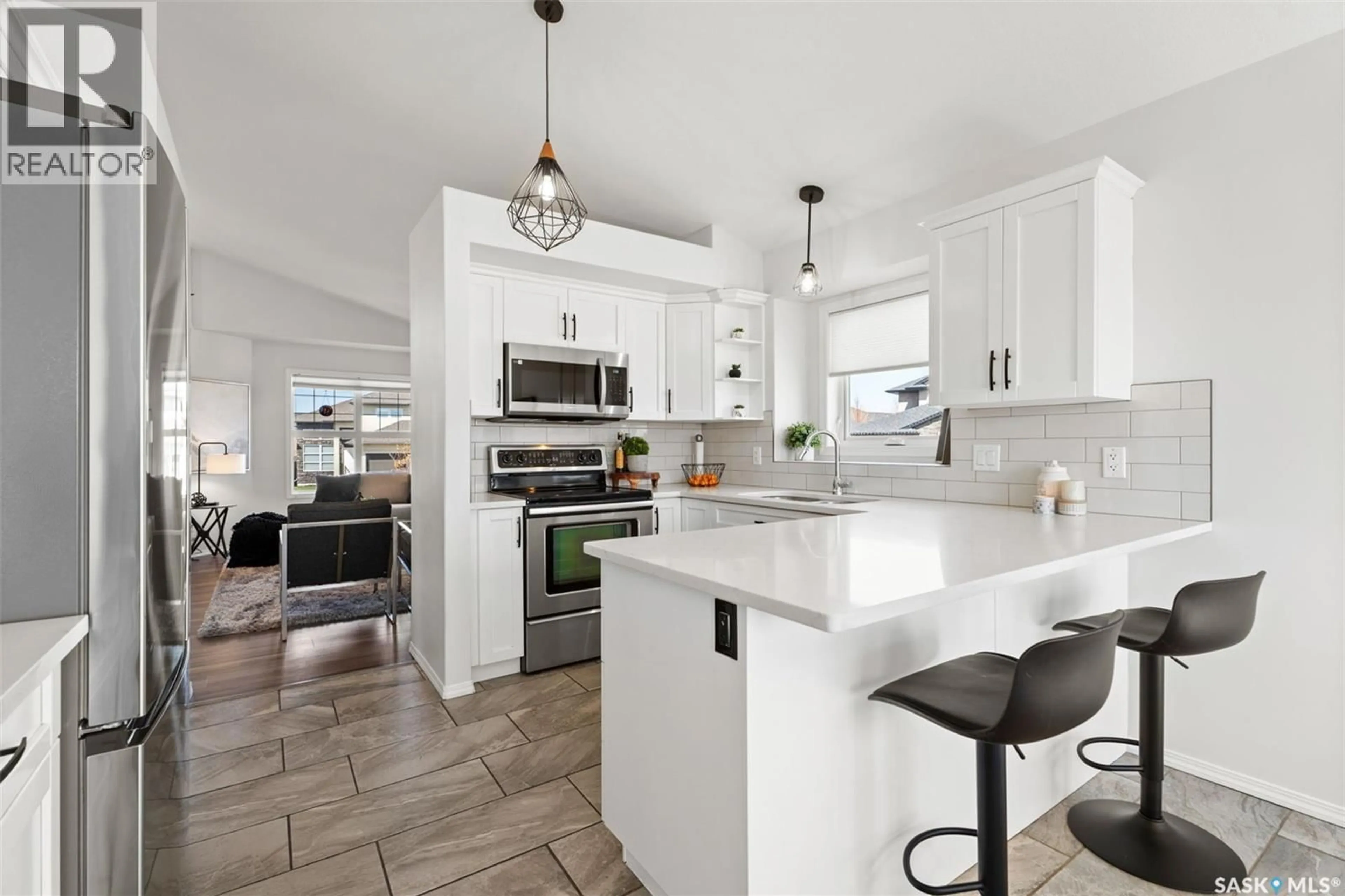 Open concept kitchen, ceramic/tile floor for 147 BLACKSTOCK COVE, Saskatoon Saskatchewan S7T0H4