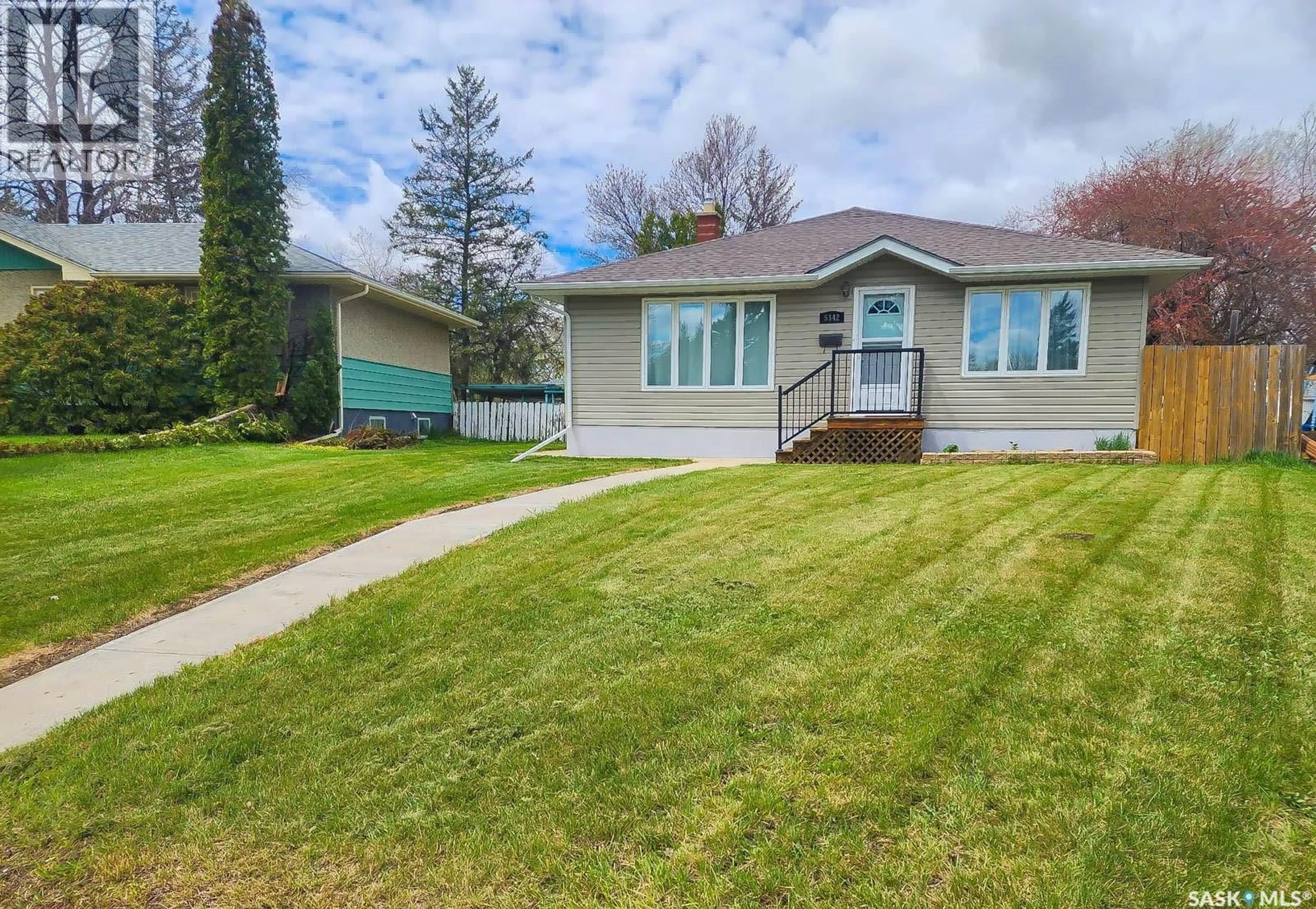 A pic from outside/outdoor area/front of a property/back of a property/a pic from drone, street for 5342 5TH AVENUE, Regina Saskatchewan S4T0M4