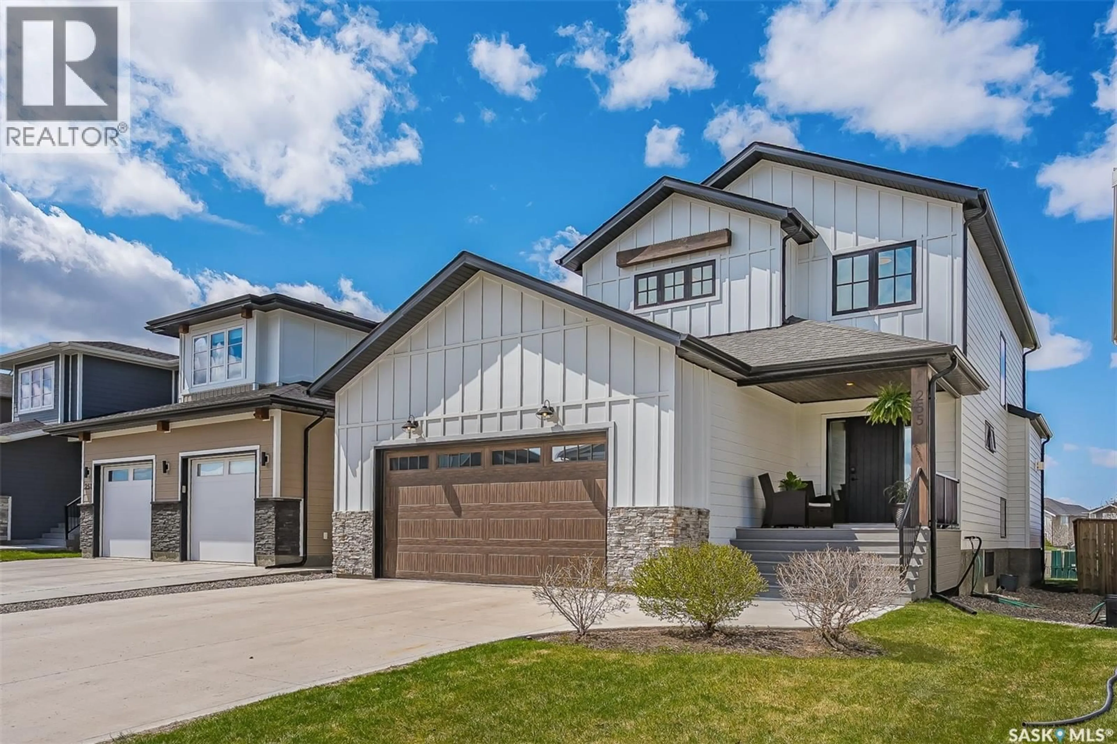 Home with vinyl exterior material, street for 255 GREYEYES-STEELE WAY, Saskatoon Saskatchewan S7V0M6