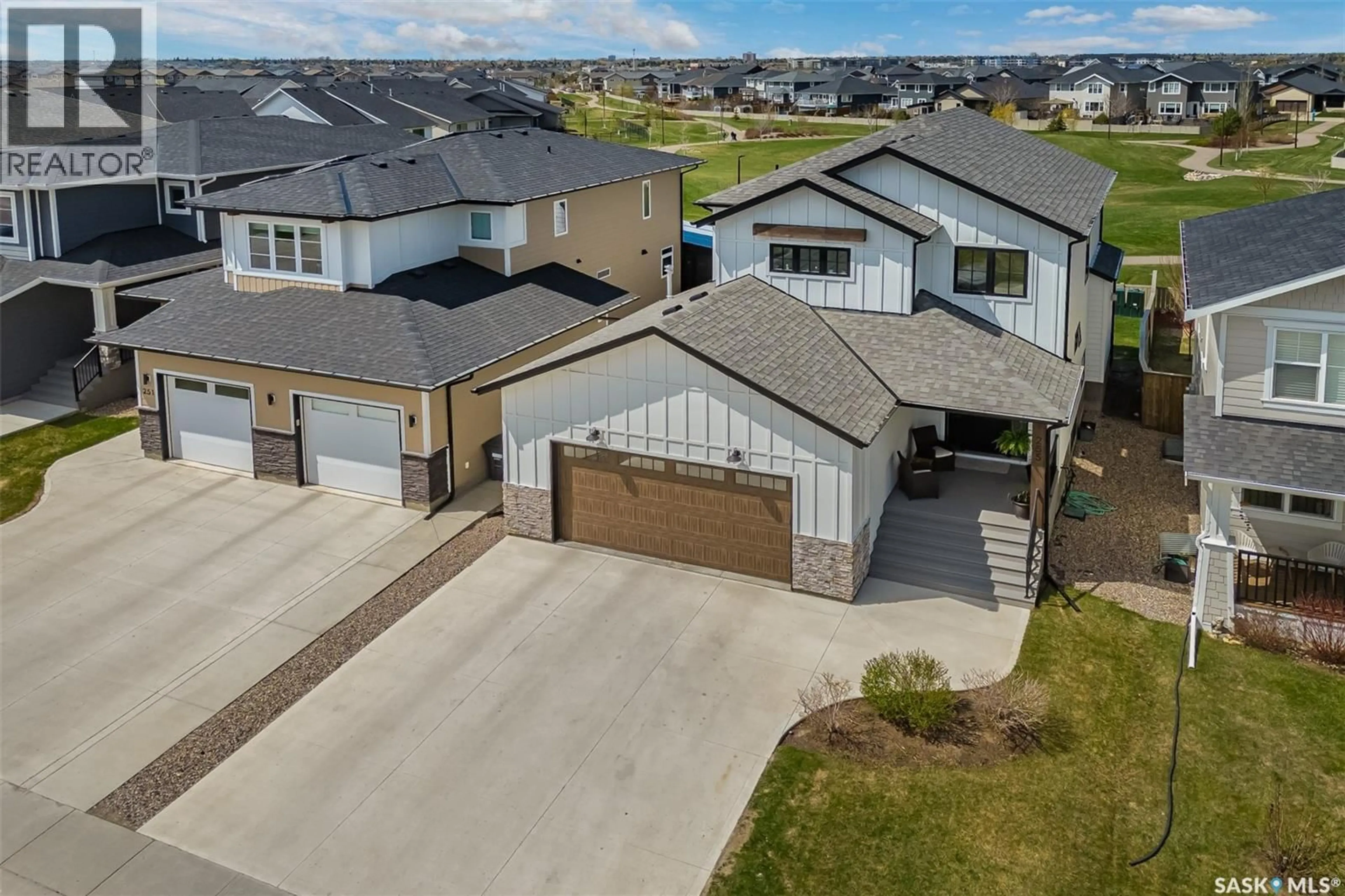 A pic from outside/outdoor area/front of a property/back of a property/a pic from drone, street for 255 GREYEYES-STEELE WAY, Saskatoon Saskatchewan S7V0M6