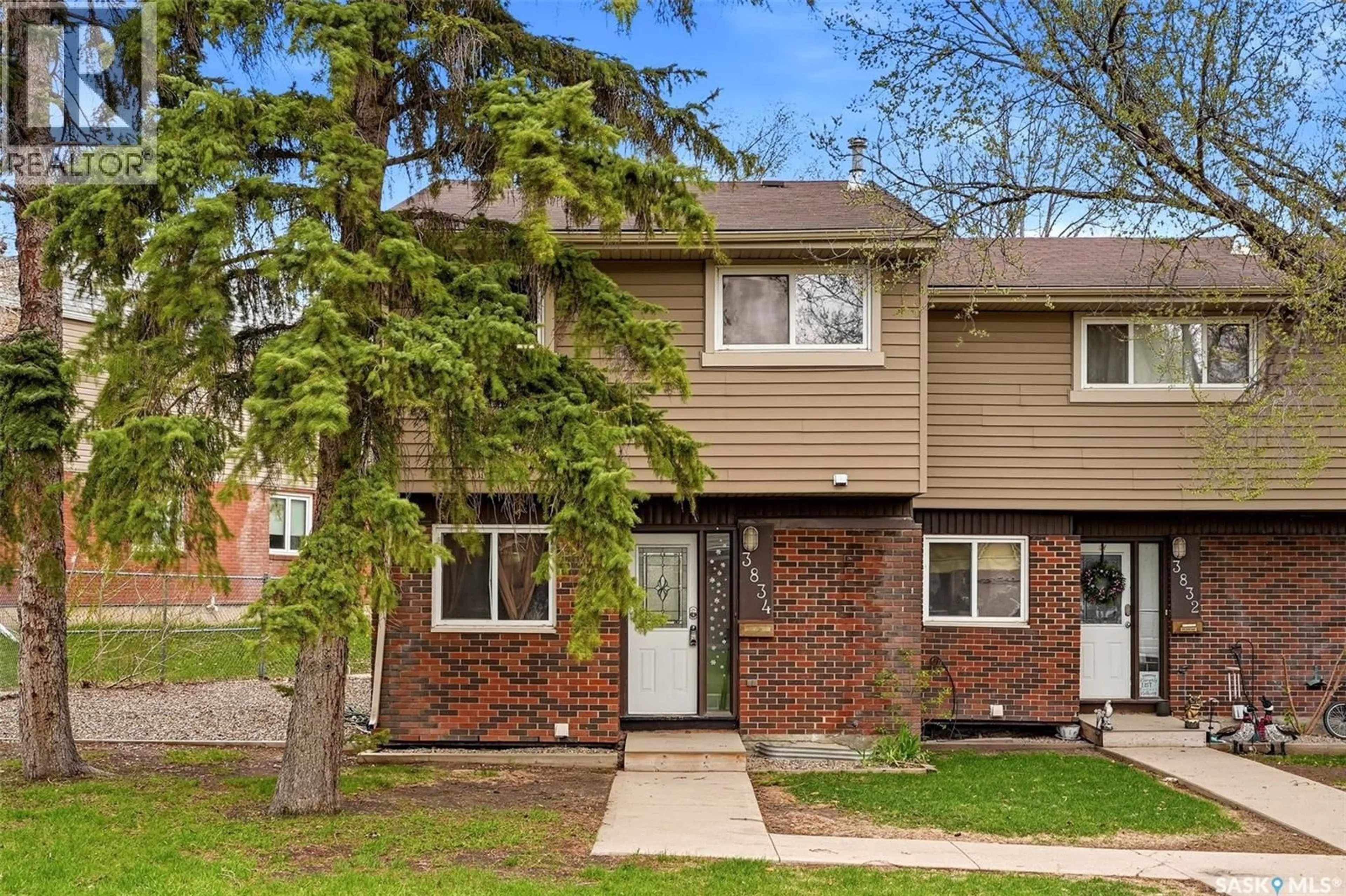 Home with brick exterior material, street for 3834 CASTLE ROAD, Regina Saskatchewan S4S6M7