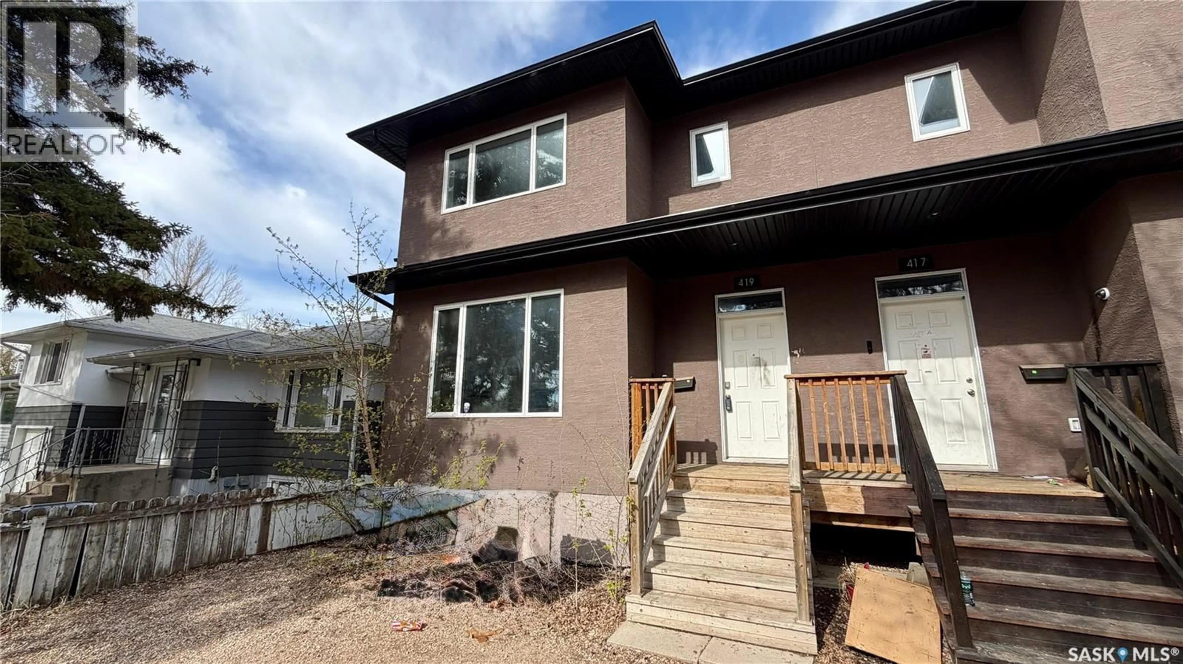 Home with vinyl exterior material, street for 419 S AVENUE S, Saskatoon Saskatchewan S7M3A3