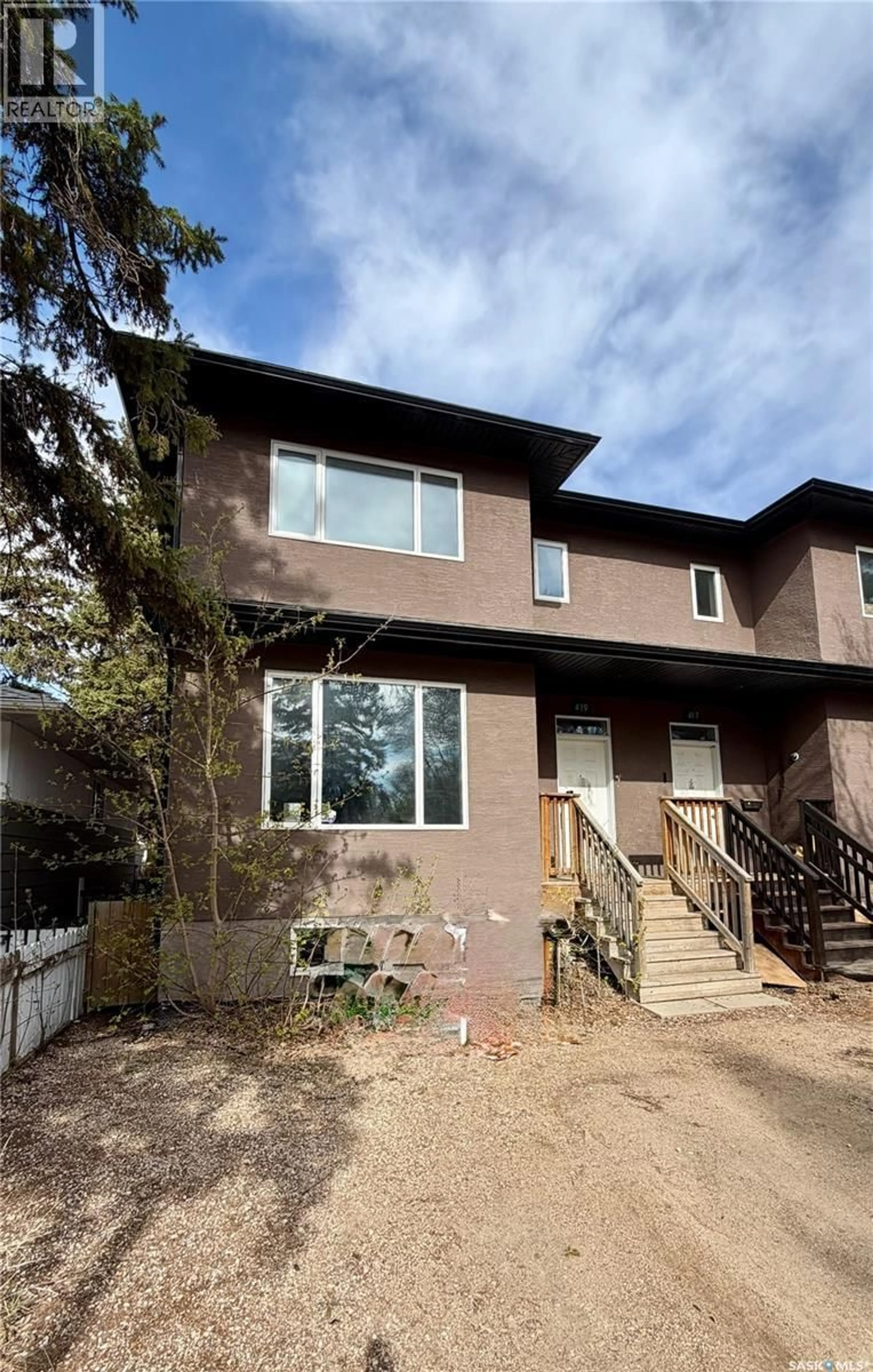Home with brick exterior material, building for 419 S AVENUE S, Saskatoon Saskatchewan S7M3A3
