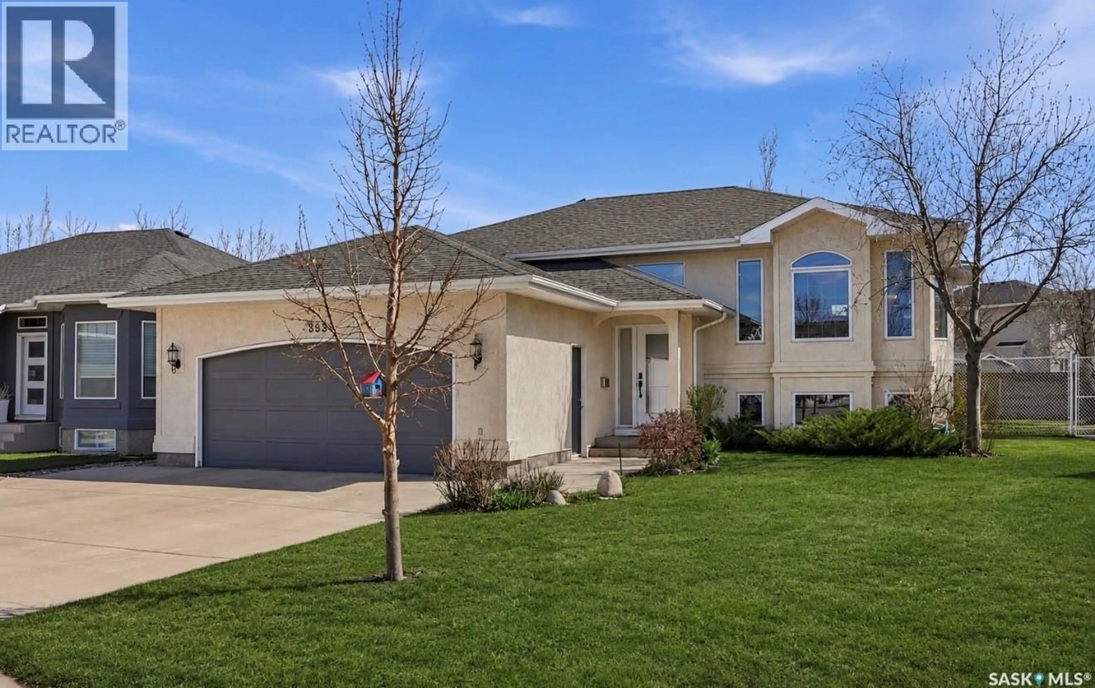 Home with vinyl exterior material, street for 502 LE MAY CRESCENT, Saskatoon Saskatchewan S7S1L1