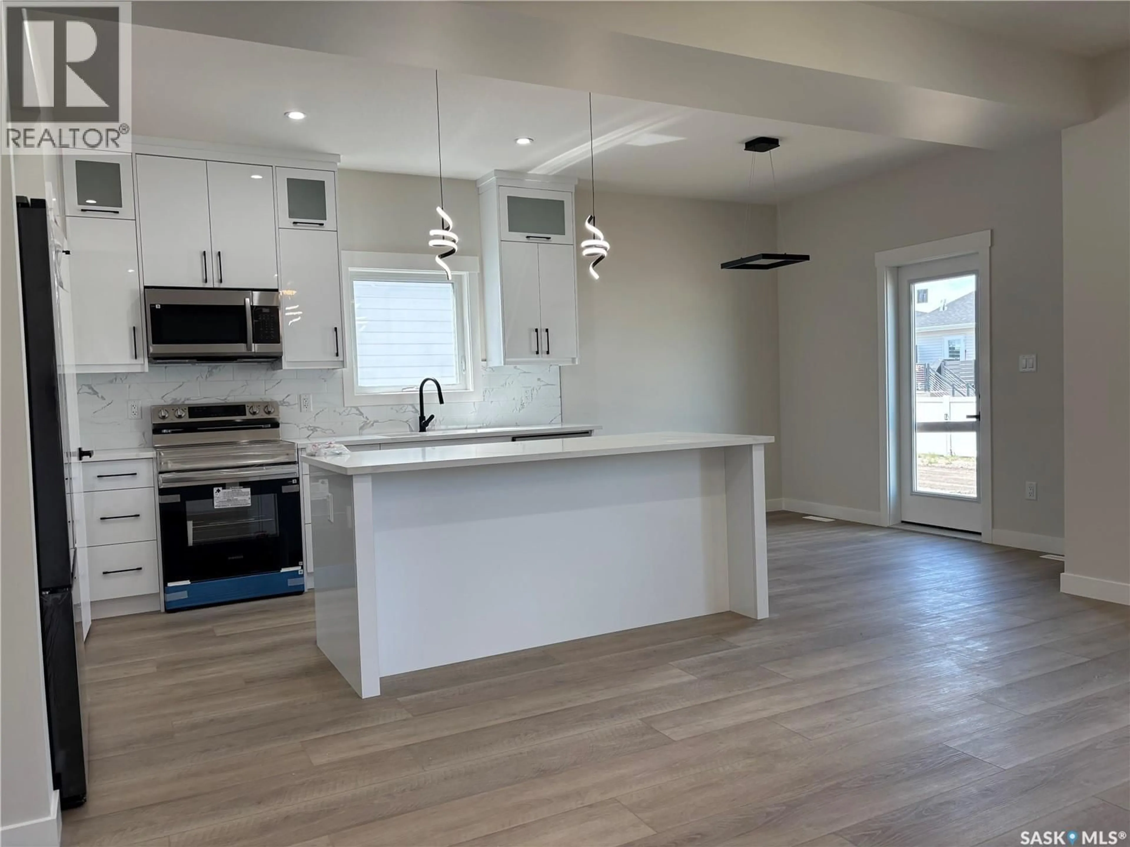 Open concept kitchen, unknown for 222 VETERANS DRIVE, Warman Saskatchewan S0K4S4