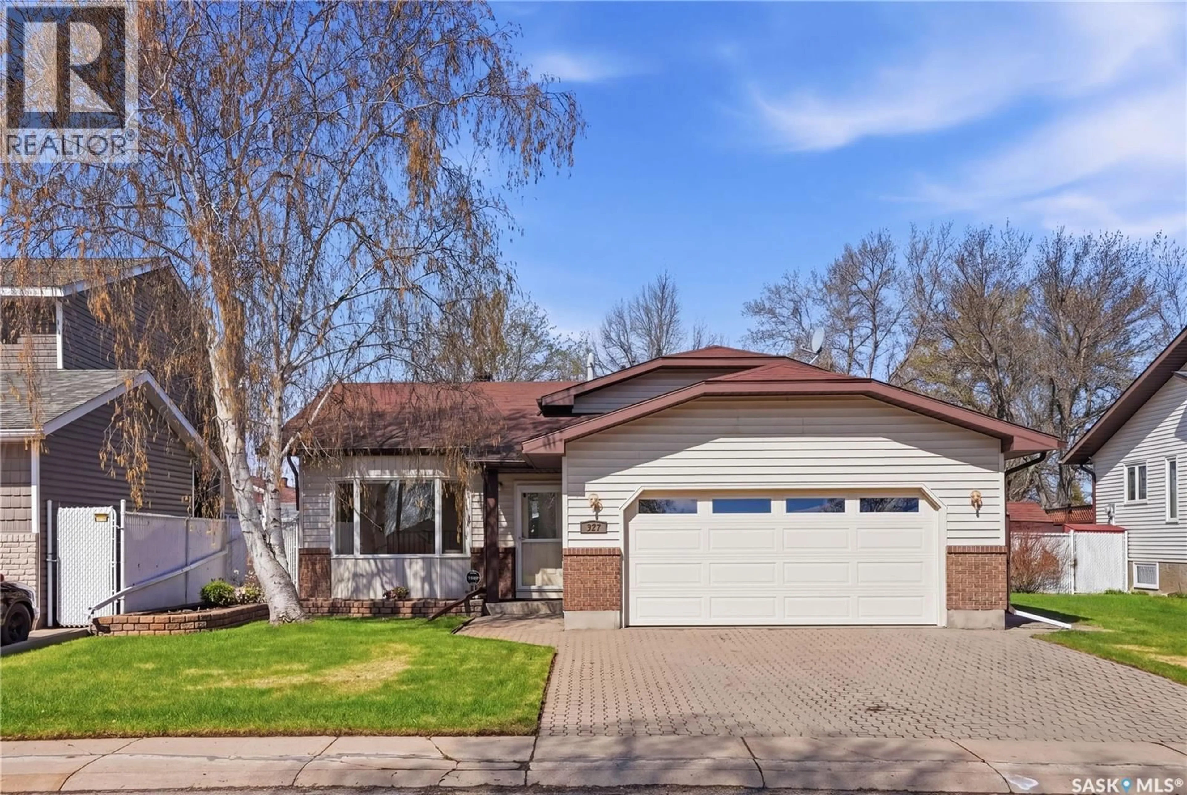 Home with brick exterior material, street for 227 FLAVELLE CRESCENT, Saskatoon Saskatchewan S7L6L1