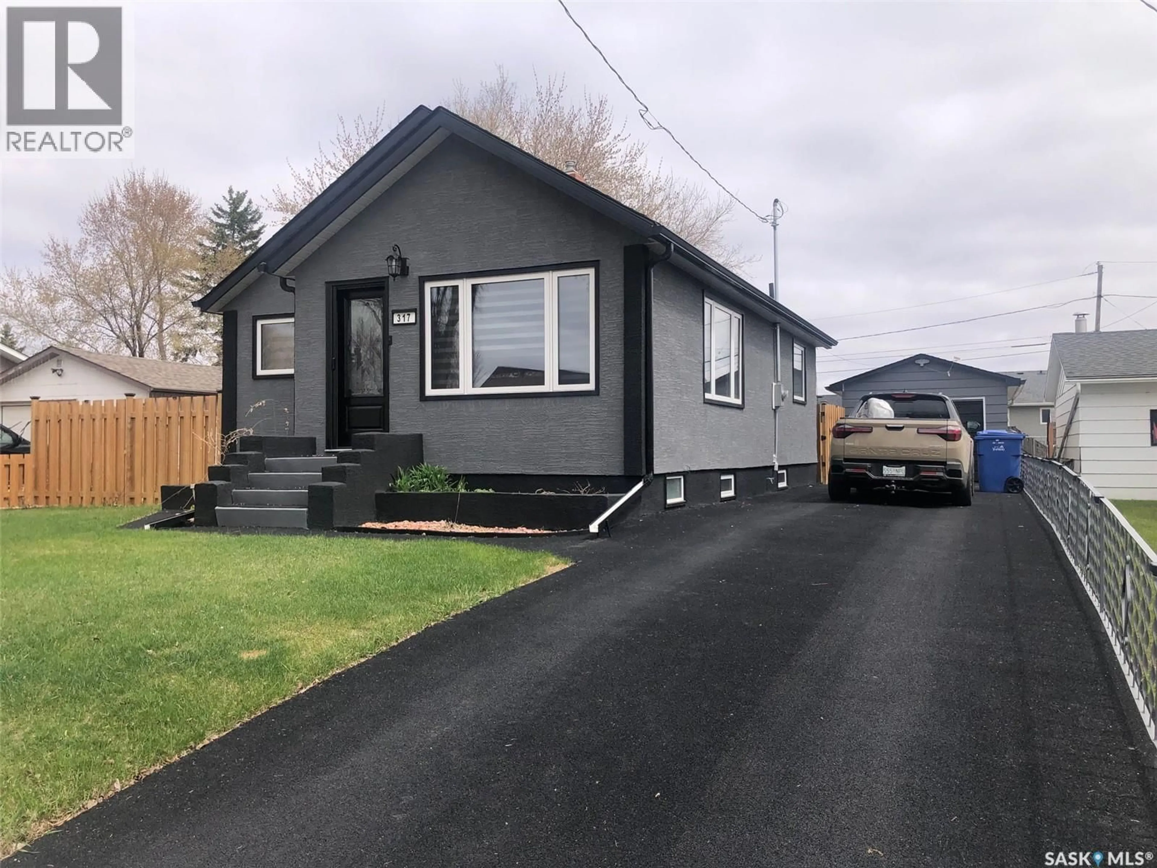 Home with vinyl exterior material, street for 317 MAPLE AVENUE, Yorkton Saskatchewan S3N1W9