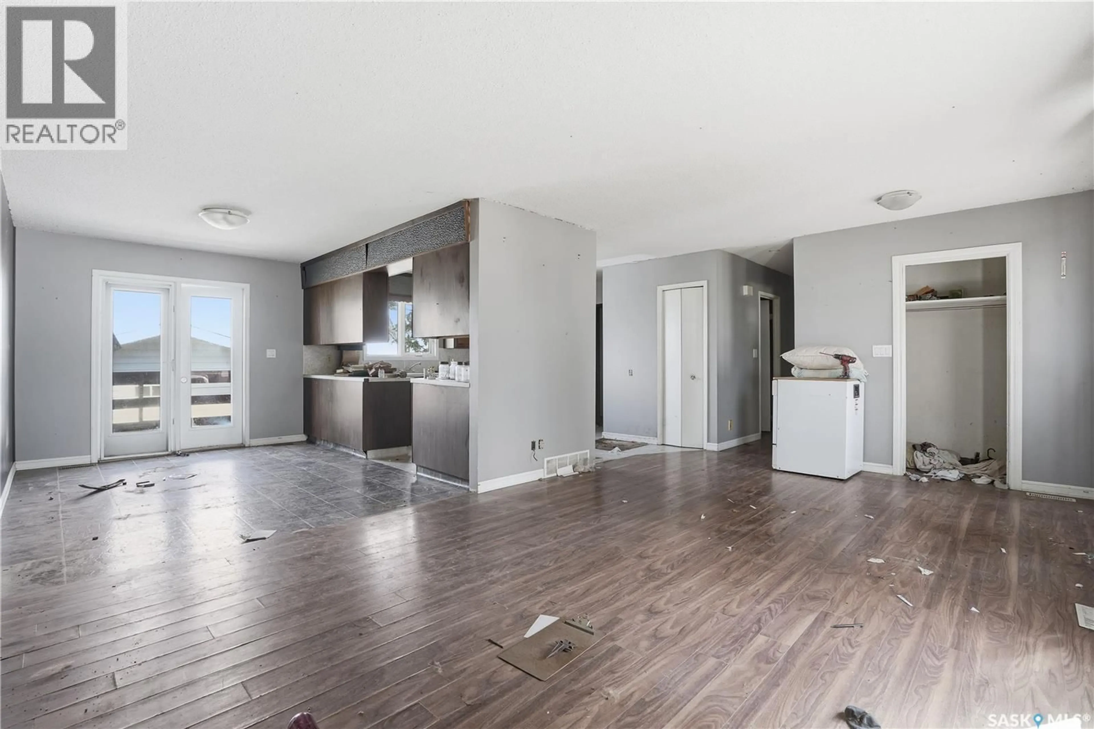 Open concept kitchen, wood/laminate floor for 512 4TH AVENUE, Assiniboia Saskatchewan S0H0B0