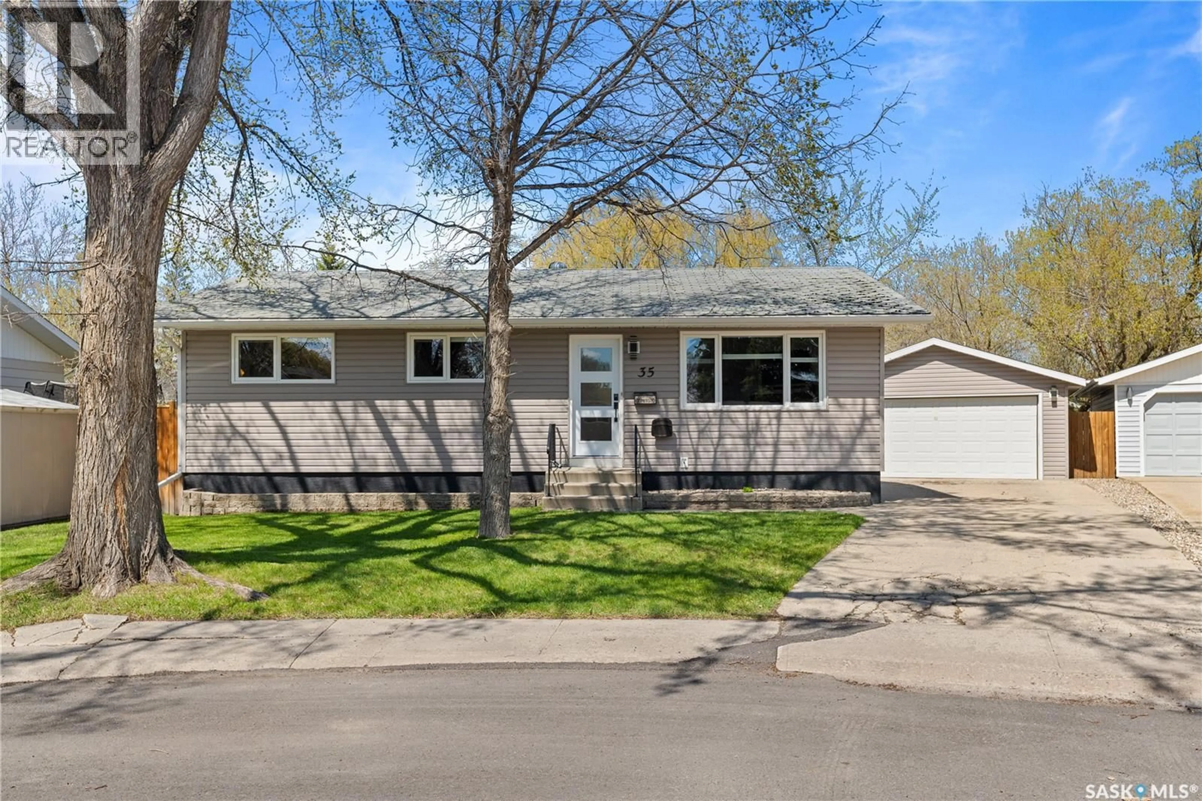 Home with vinyl exterior material, street for 35 SYMONS PLACE, Regina Saskatchewan S4X1M7