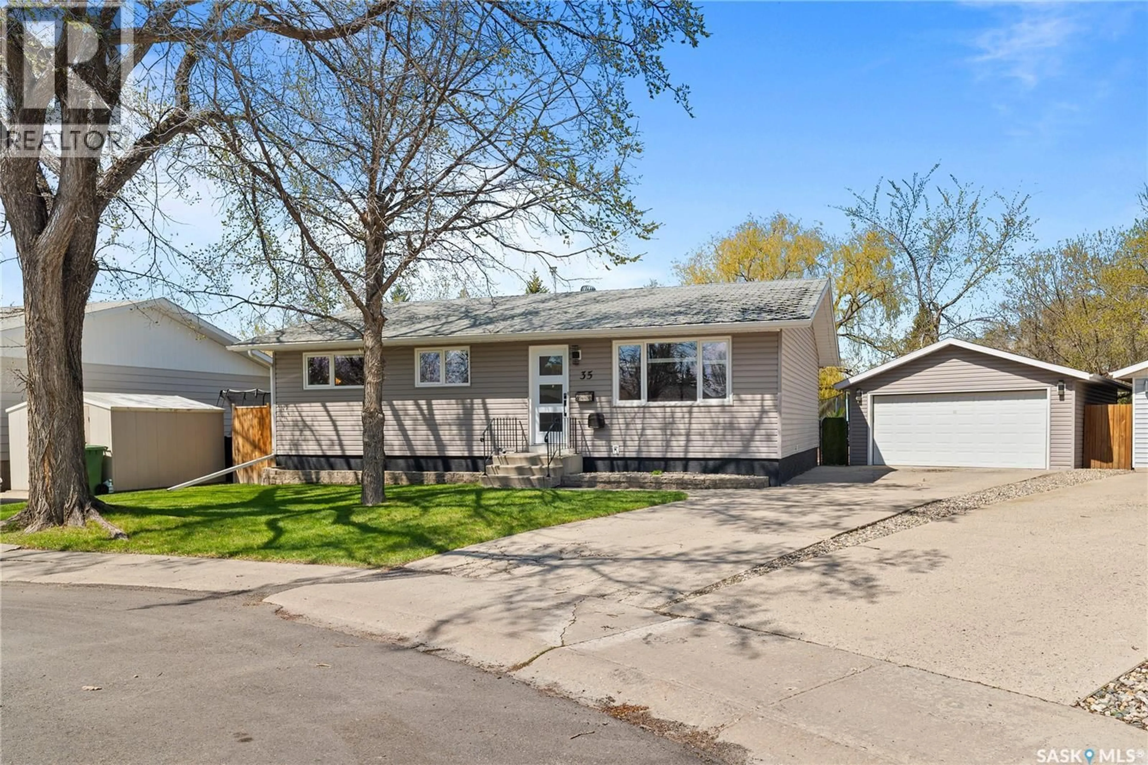 Home with vinyl exterior material, street for 35 SYMONS PLACE, Regina Saskatchewan S4X1M7