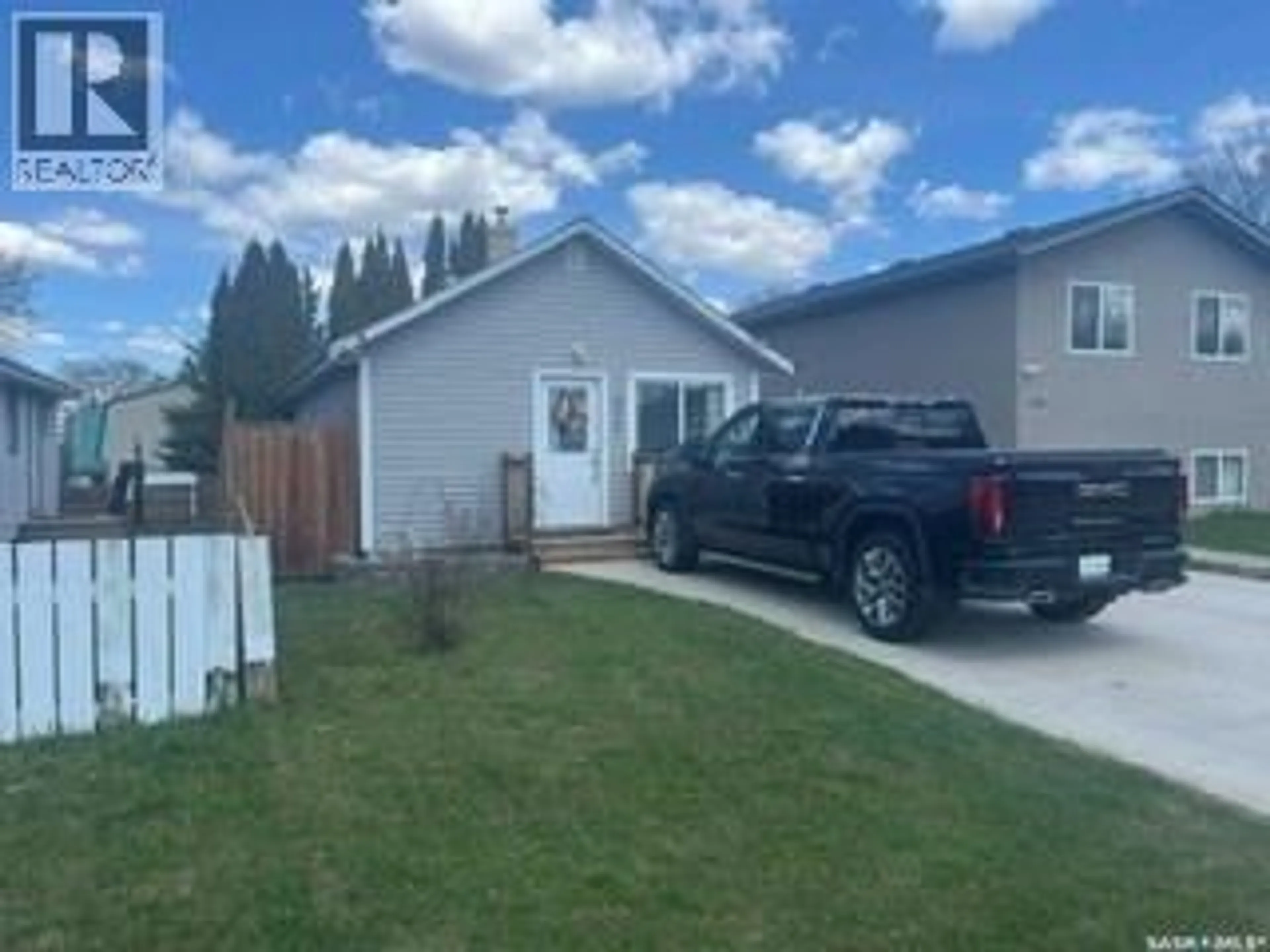 Home with vinyl exterior material, street for 572 21ST STREET, Prince Albert Saskatchewan S6V1M4