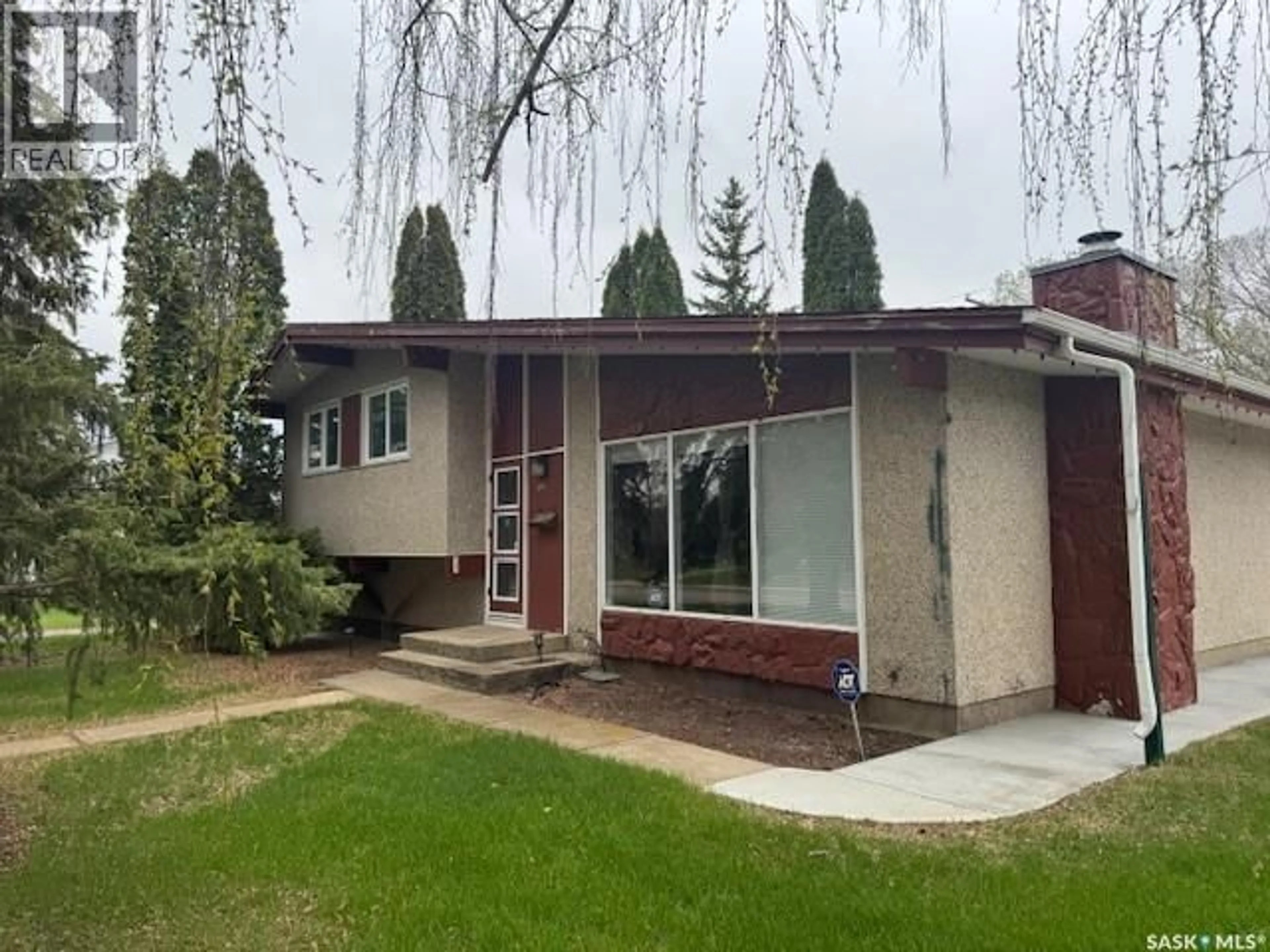 Home with vinyl exterior material, street for 1591 91ST STREET, North Battleford Saskatchewan S9A0A2