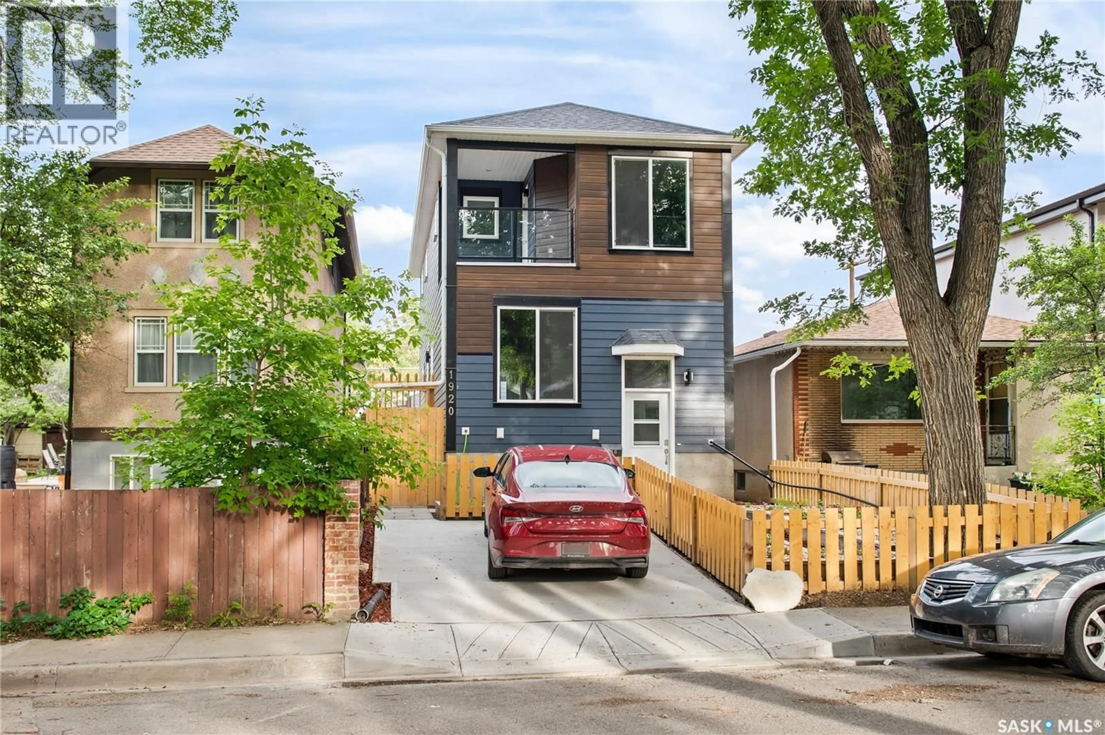 Home with brick exterior material, street for 1920 ATHOL STREET, Regina Saskatchewan S4T3E3
