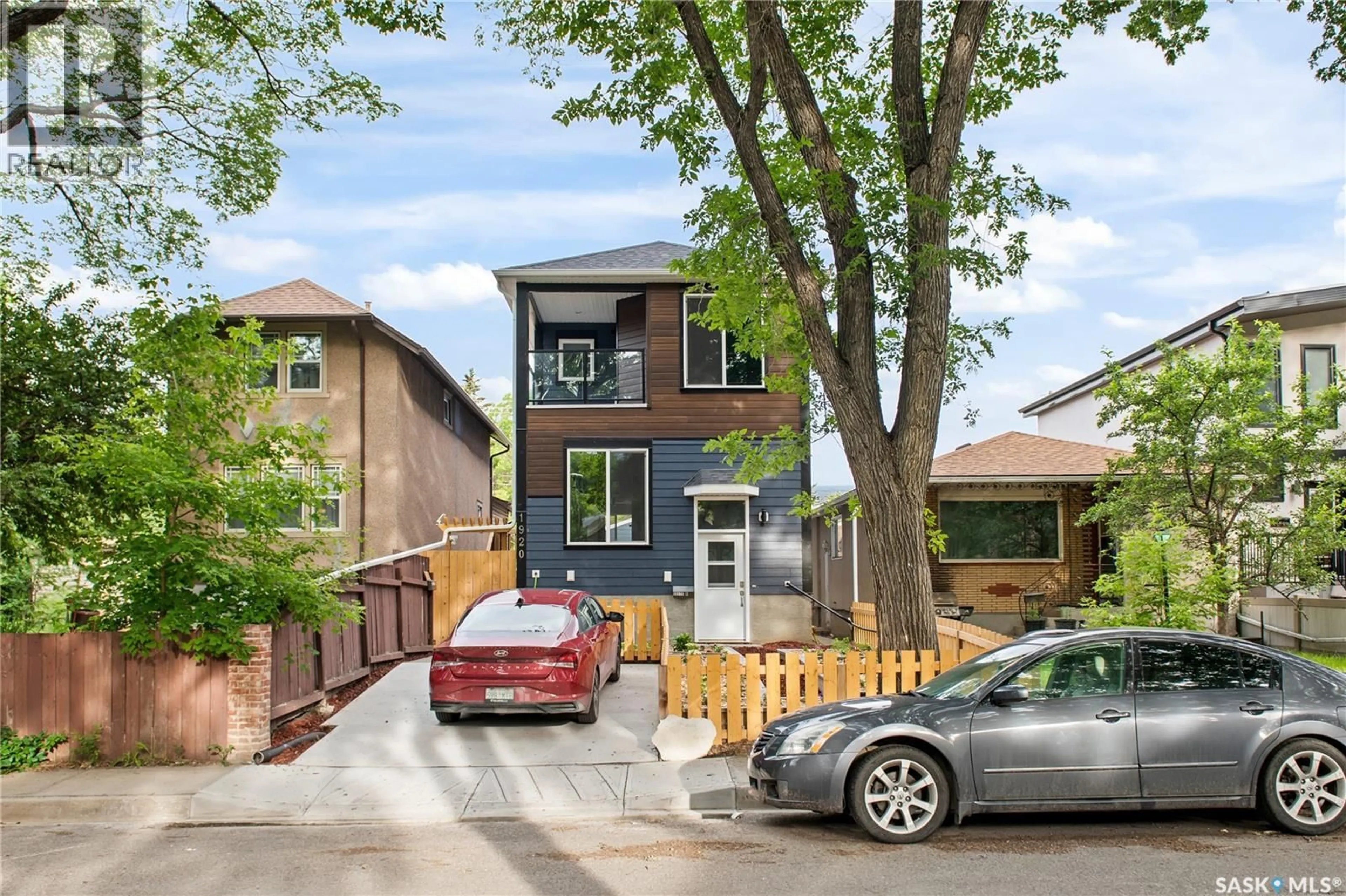Home with brick exterior material, street for 1920 ATHOL STREET, Regina Saskatchewan S4T3E3