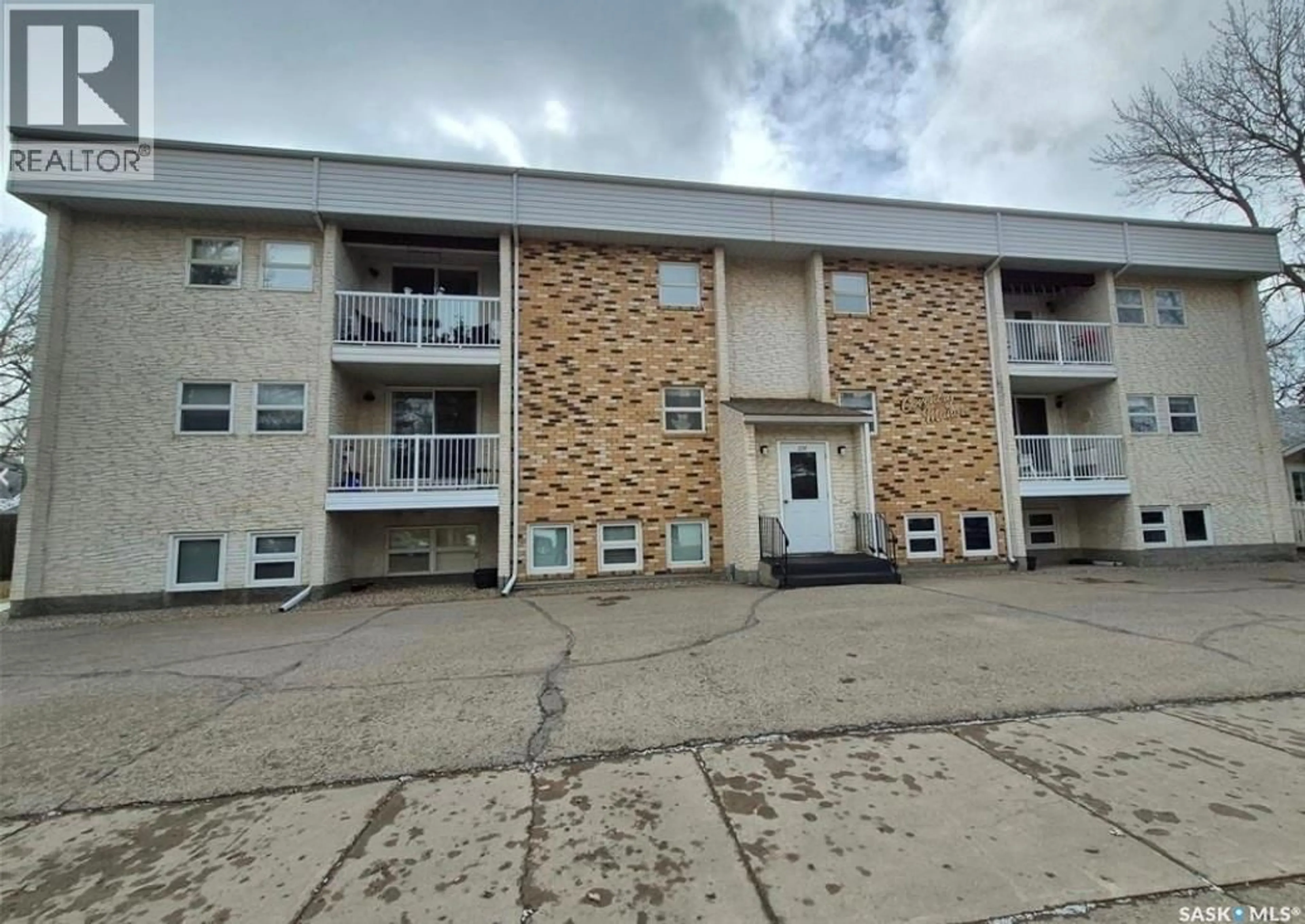 A pic from outside/outdoor area/front of a property/back of a property/a pic from drone, building for 16 228 3RD STREET, Weyburn Saskatchewan S4H0W6