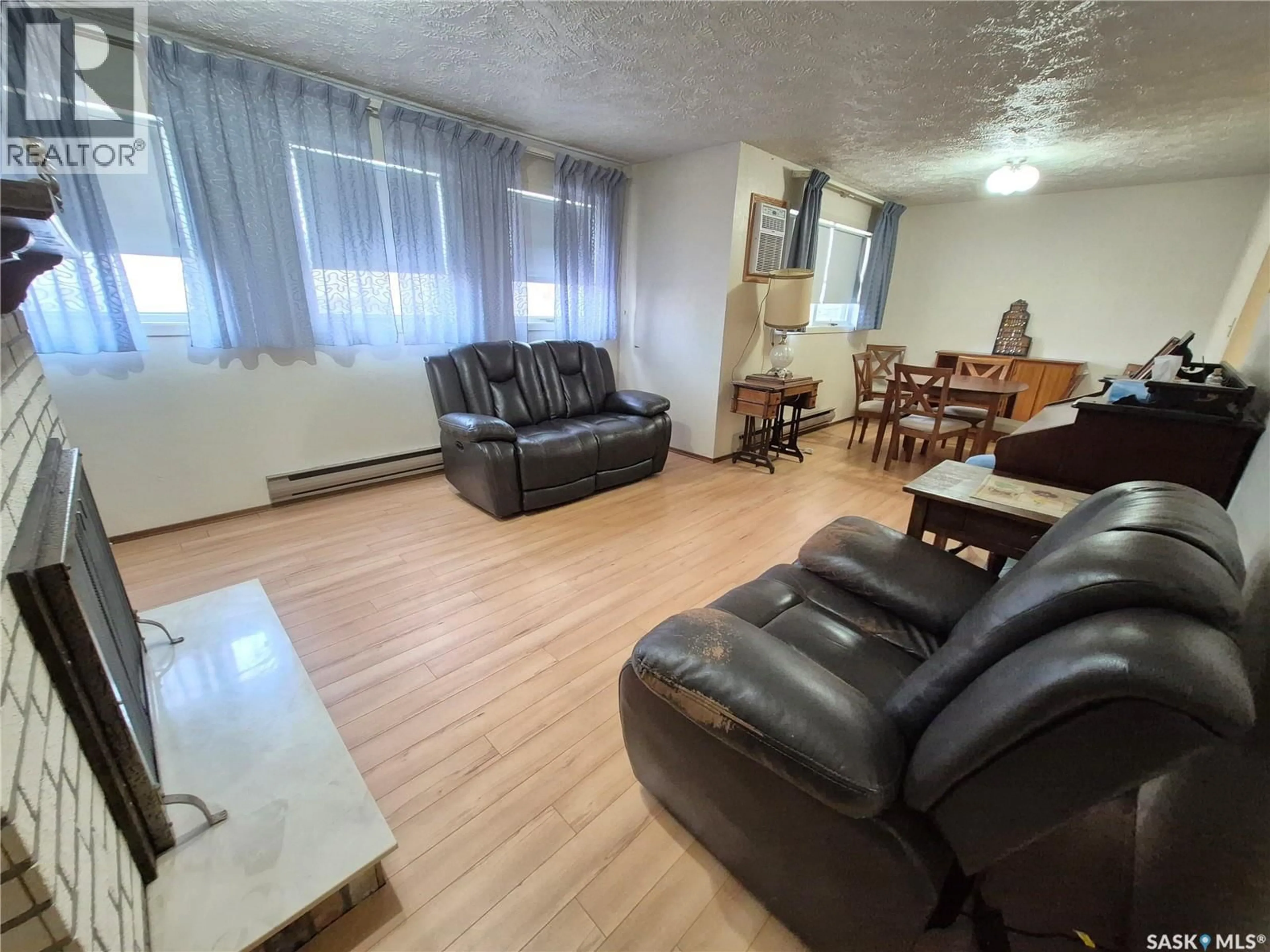 Living room with furniture, unknown for 16 228 3RD STREET, Weyburn Saskatchewan S4H0W6