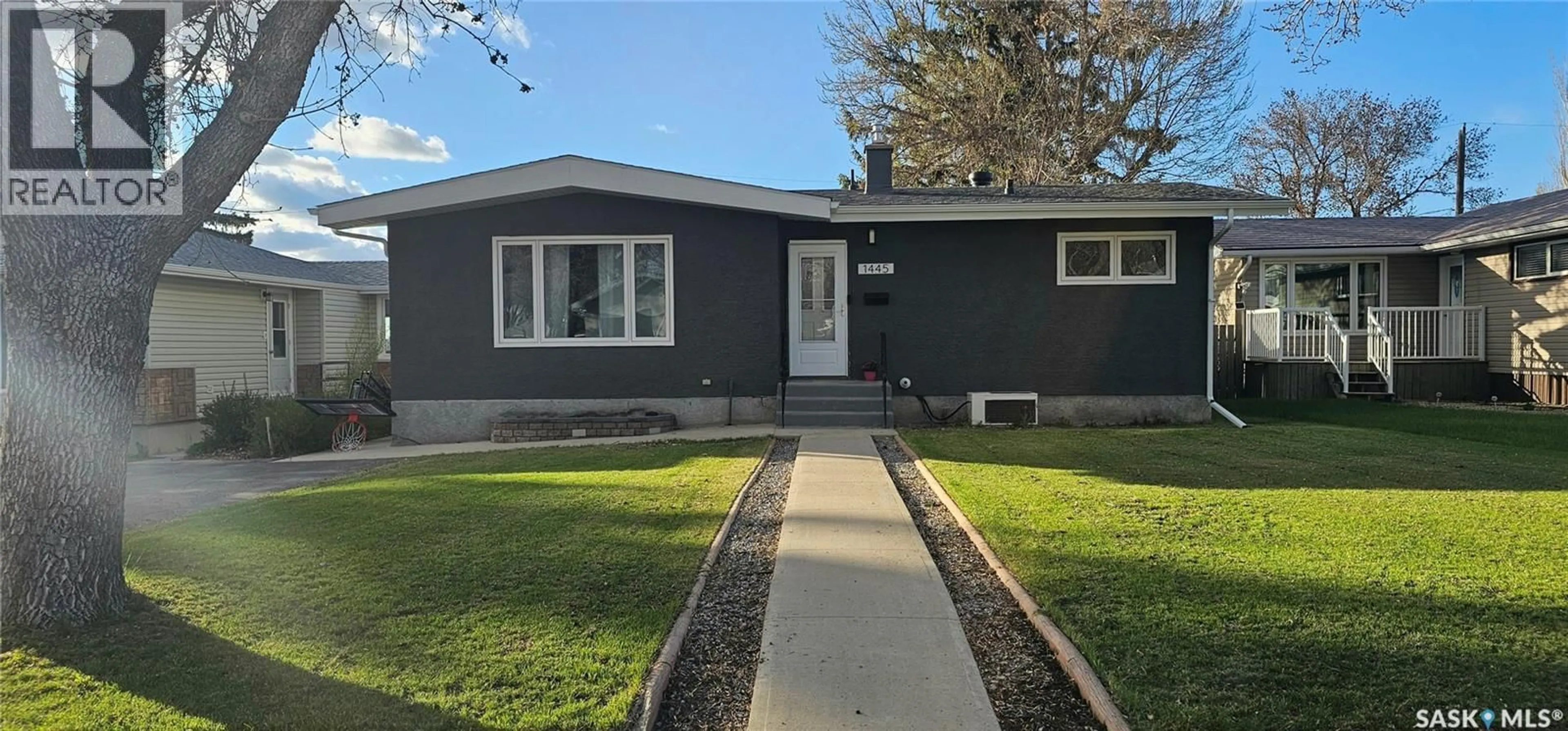 Home with vinyl exterior material, street for 1445 ASHLEY DRIVE, Swift Current Saskatchewan S9H1N6