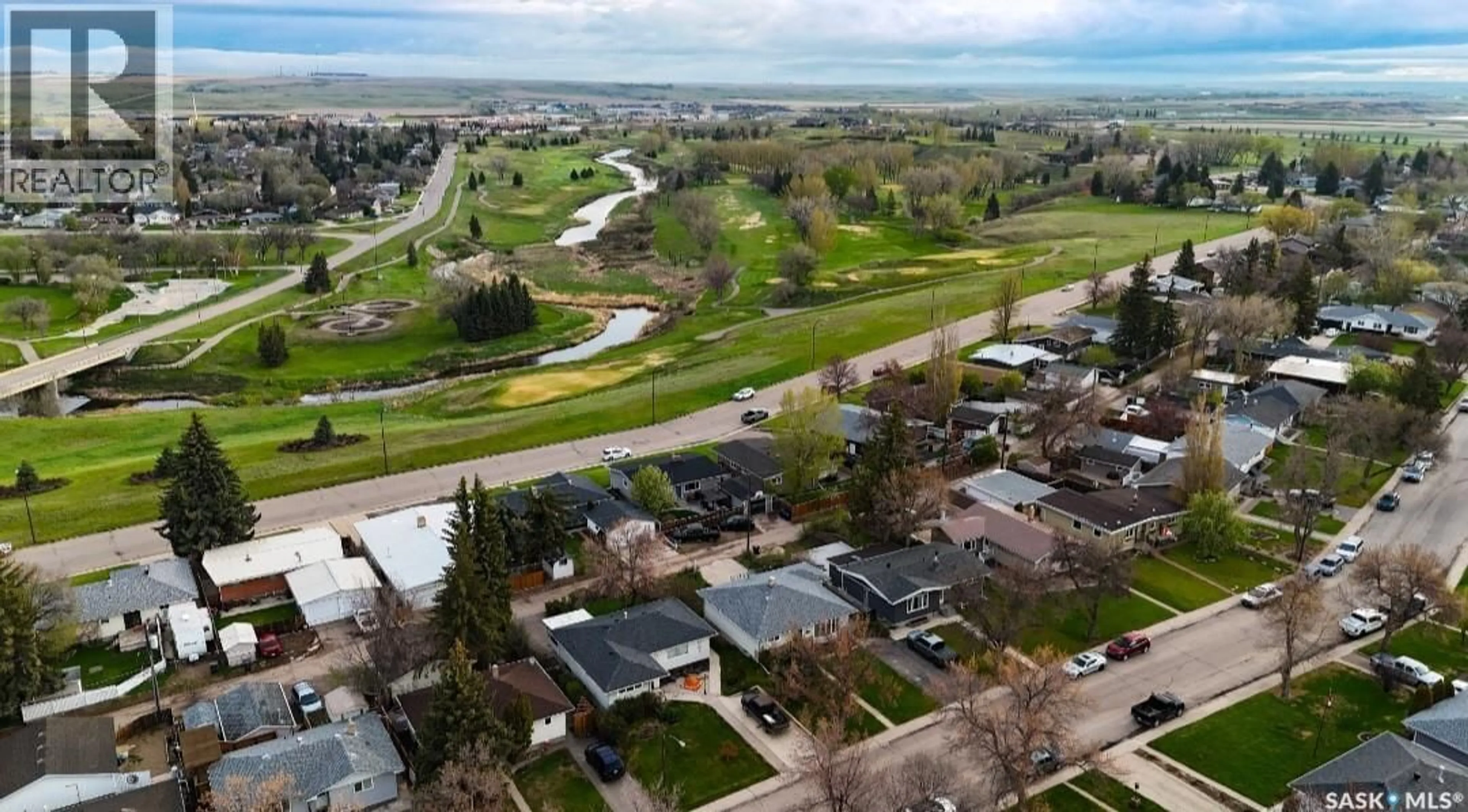A pic from outside/outdoor area/front of a property/back of a property/a pic from drone, street for 1445 ASHLEY DRIVE, Swift Current Saskatchewan S9H1N6