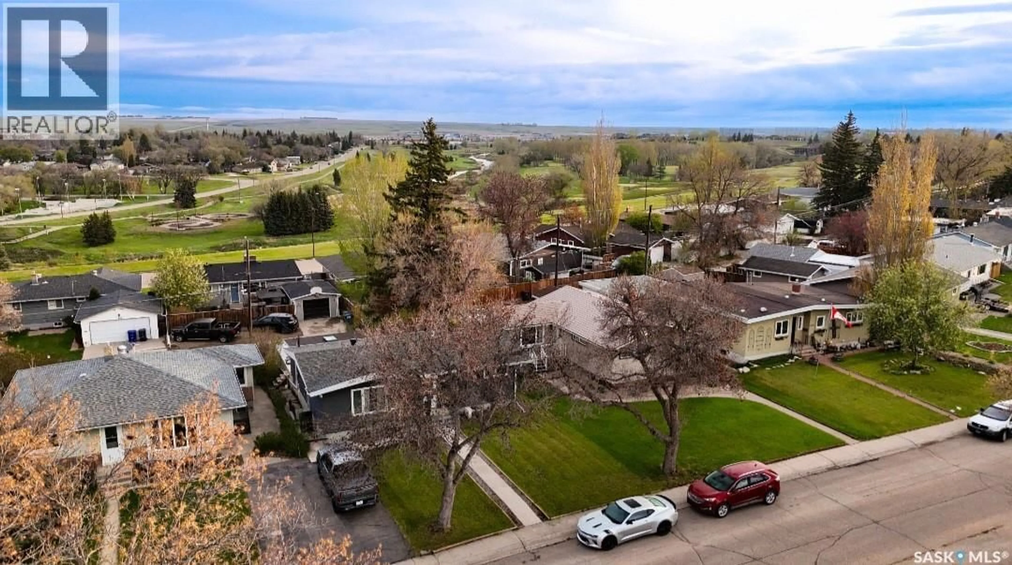 A pic from outside/outdoor area/front of a property/back of a property/a pic from drone, mountain view for 1445 ASHLEY DRIVE, Swift Current Saskatchewan S9H1N6
