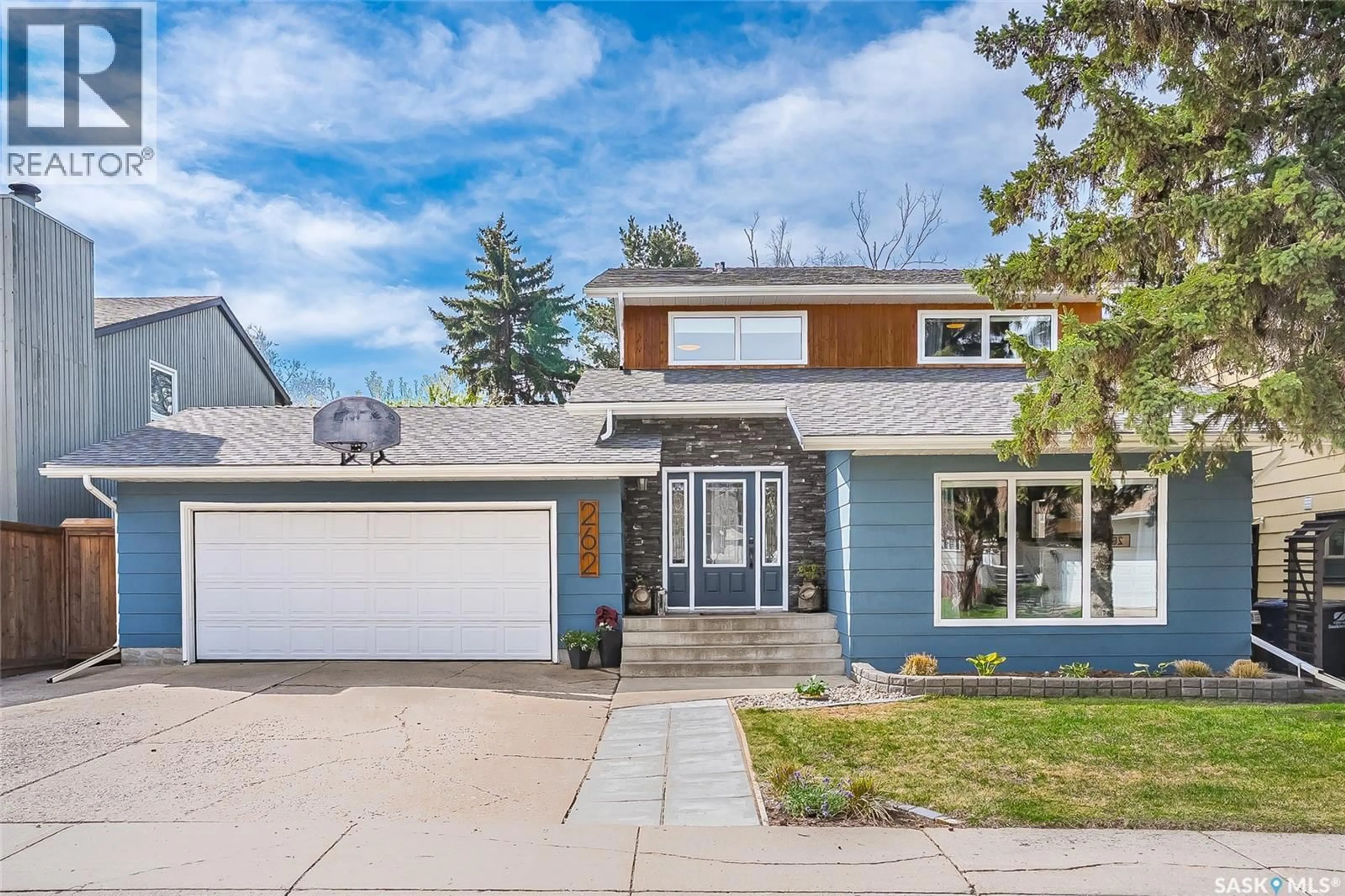 Home with brick exterior material, street for 262 CHRISTOPHER CRESCENT, Saskatoon Saskatchewan S7J3R6
