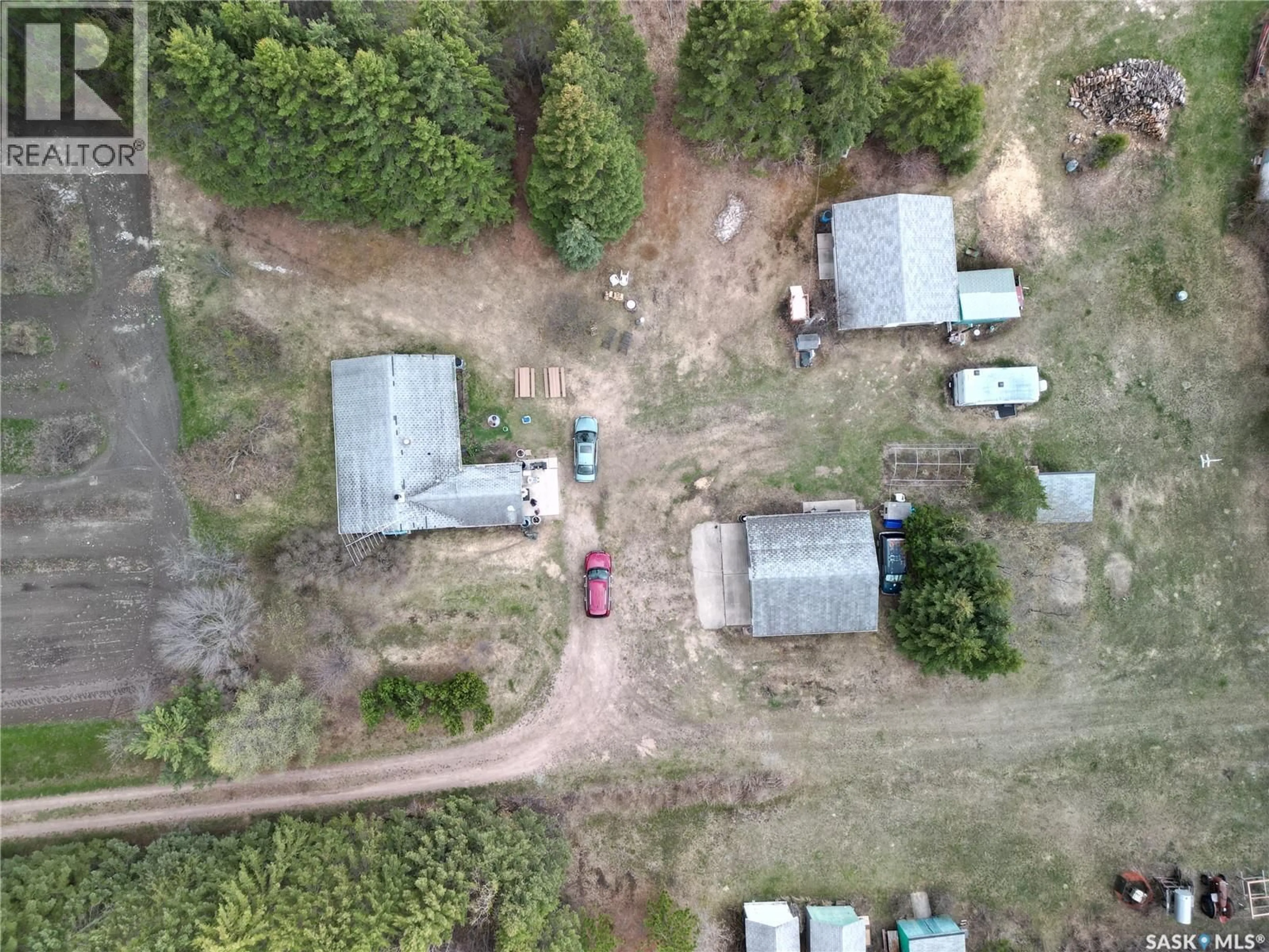 A pic from outside/outdoor area/front of a property/back of a property/a pic from drone, forest/trees view for SCHENKER ACREAGE, Loon Lake Rm No. 561 Saskatchewan S0M1L0