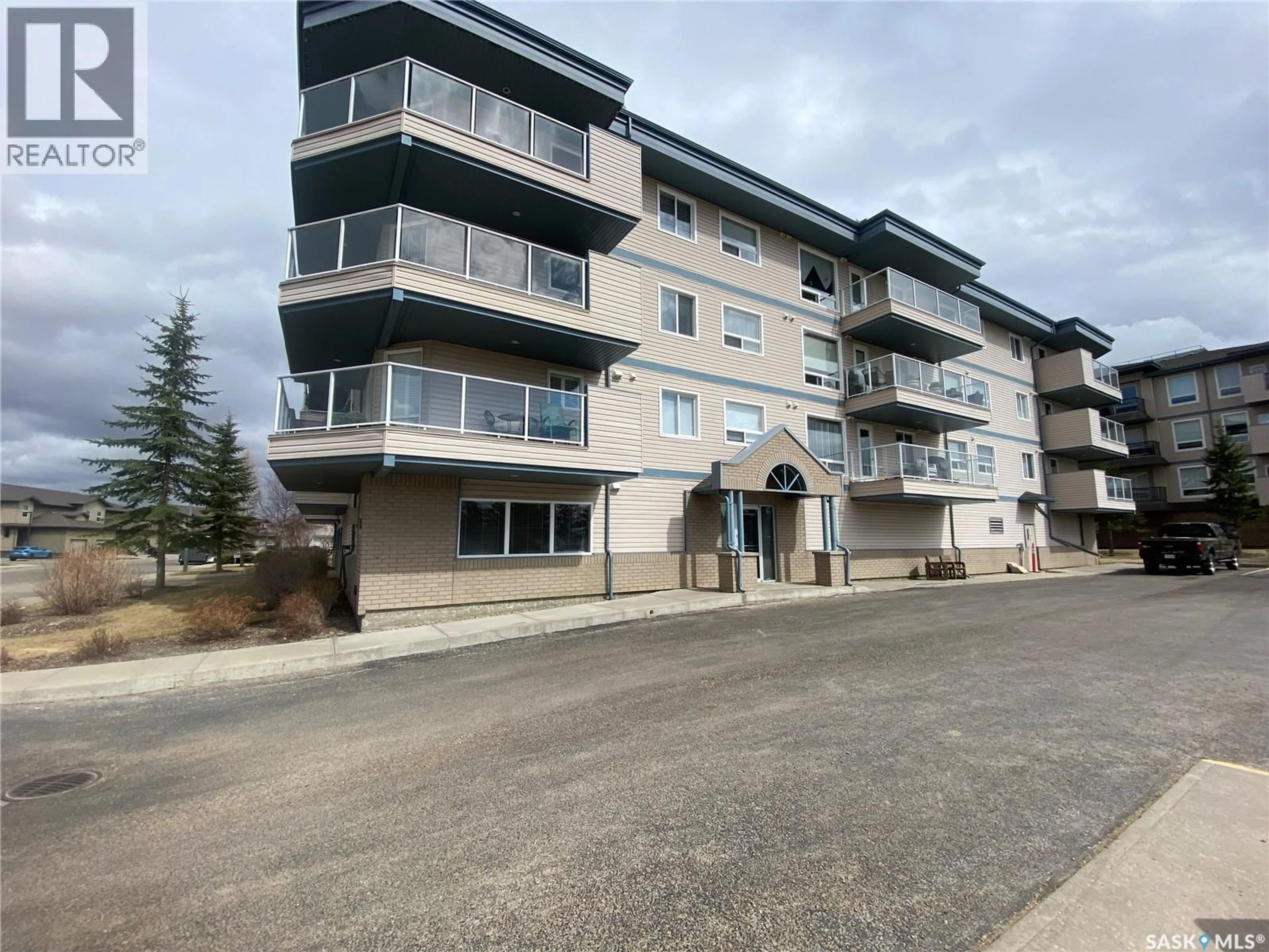 A pic from outside/outdoor area/front of a property/back of a property/a pic from drone, building for 306 - 345 MORRISON DRIVE, Yorkton Saskatchewan S3N3C4