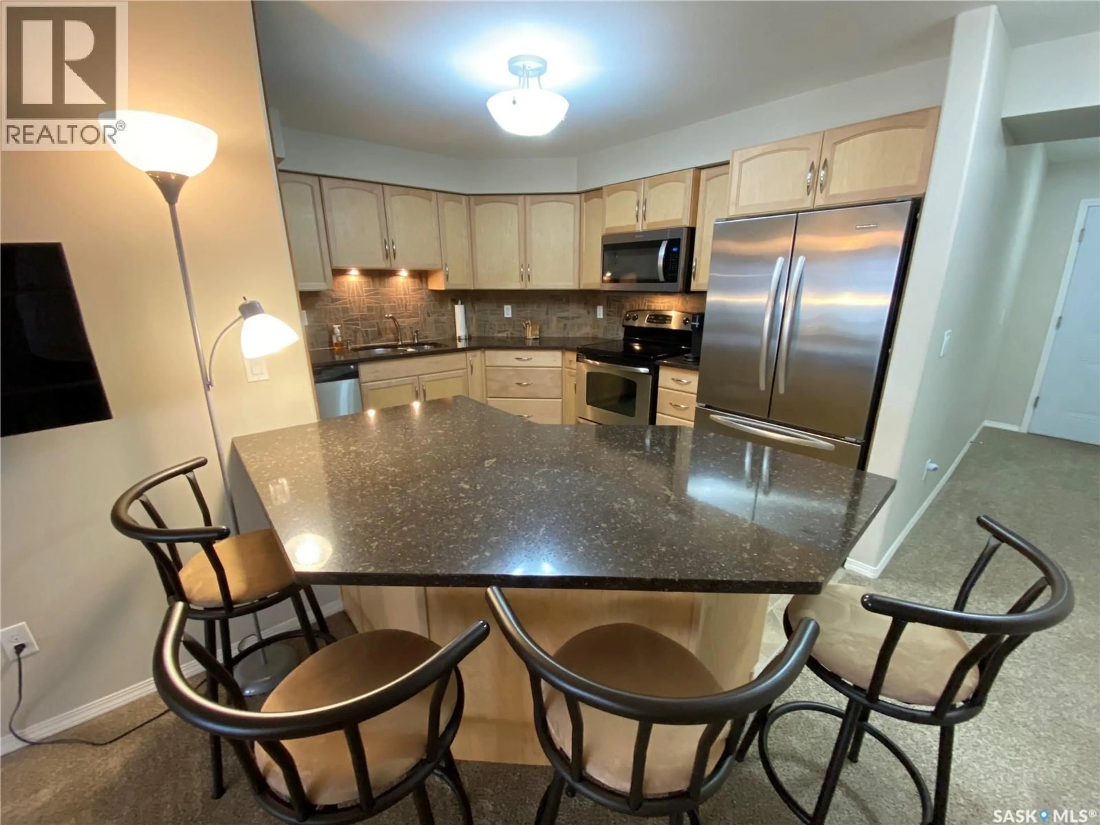 Open concept kitchen, ceramic/tile floor for 306 - 345 MORRISON DRIVE, Yorkton Saskatchewan S3N3C4