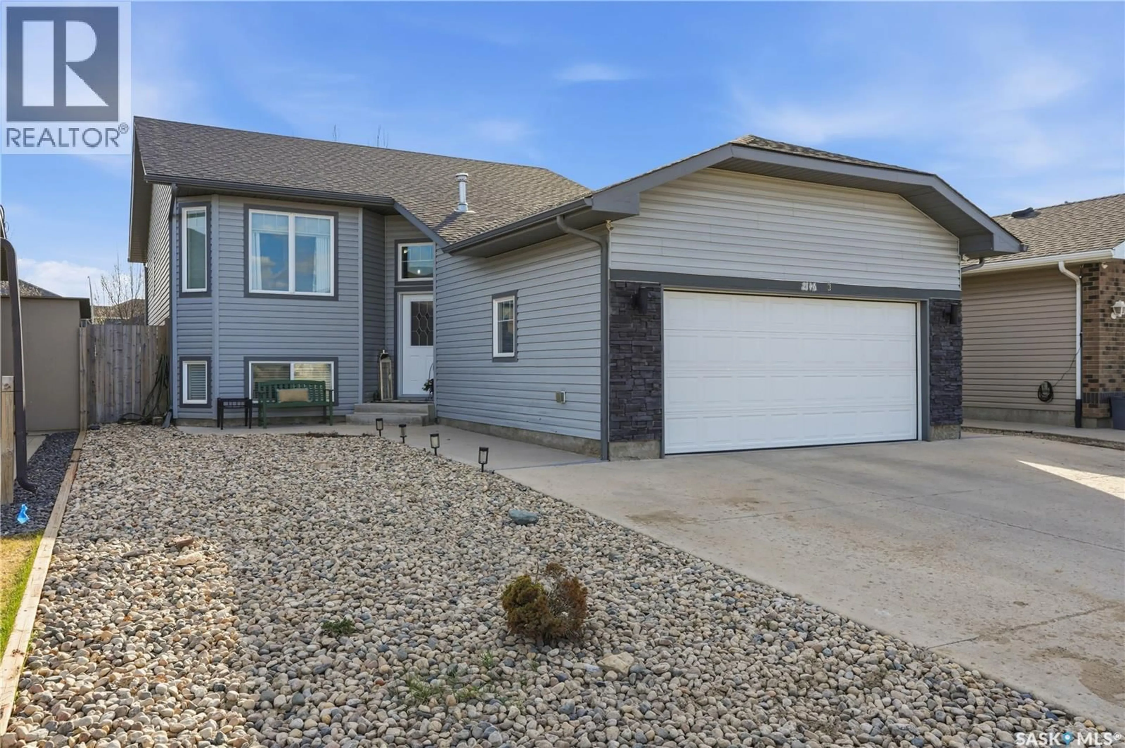 Home with vinyl exterior material, street for 2146 ROSEWOOD DRIVE, Saskatoon Saskatchewan S7V0G2