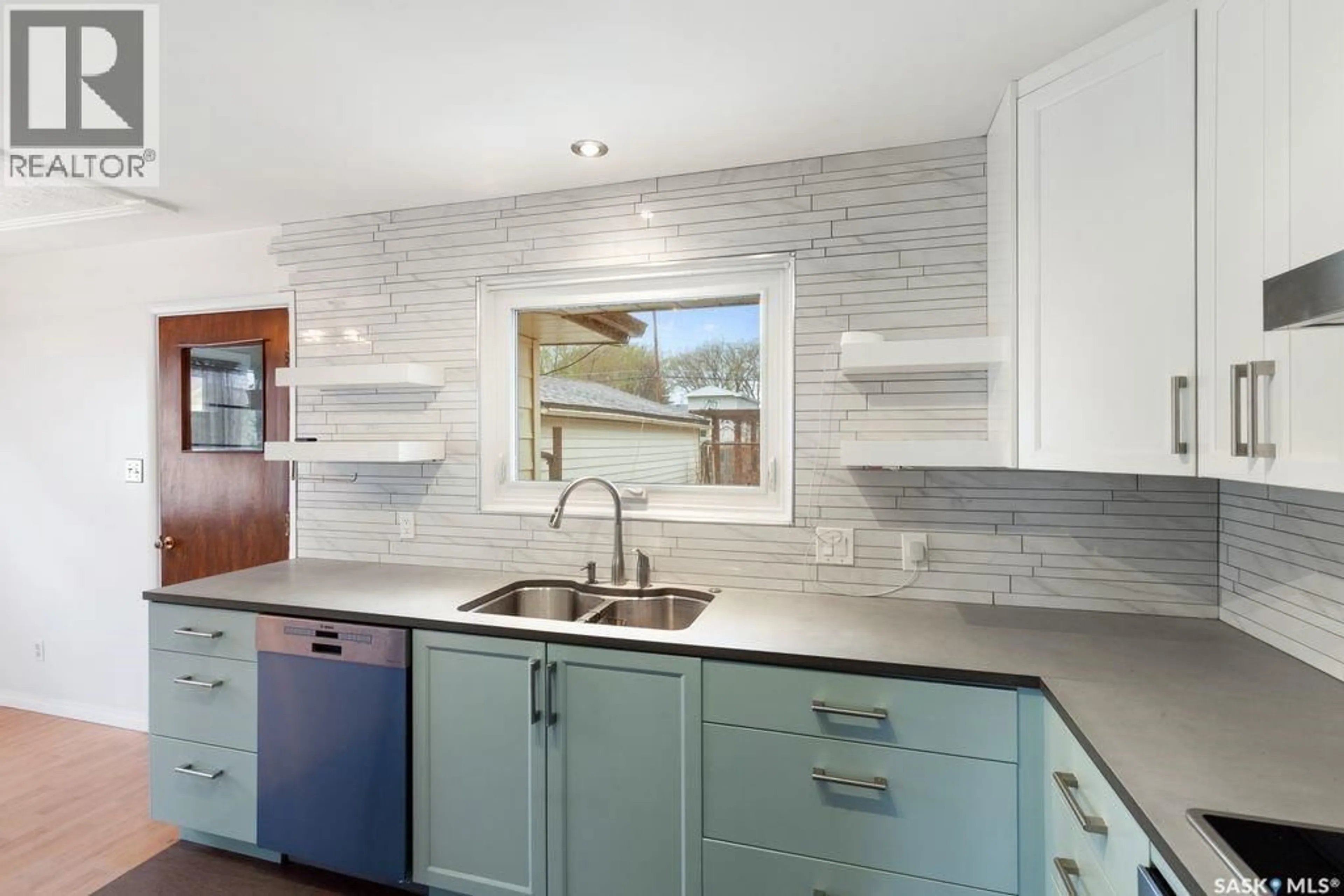 Contemporary kitchen, ceramic/tile floor for 1309 N AVENUE S, Saskatoon Saskatchewan S7M2R2