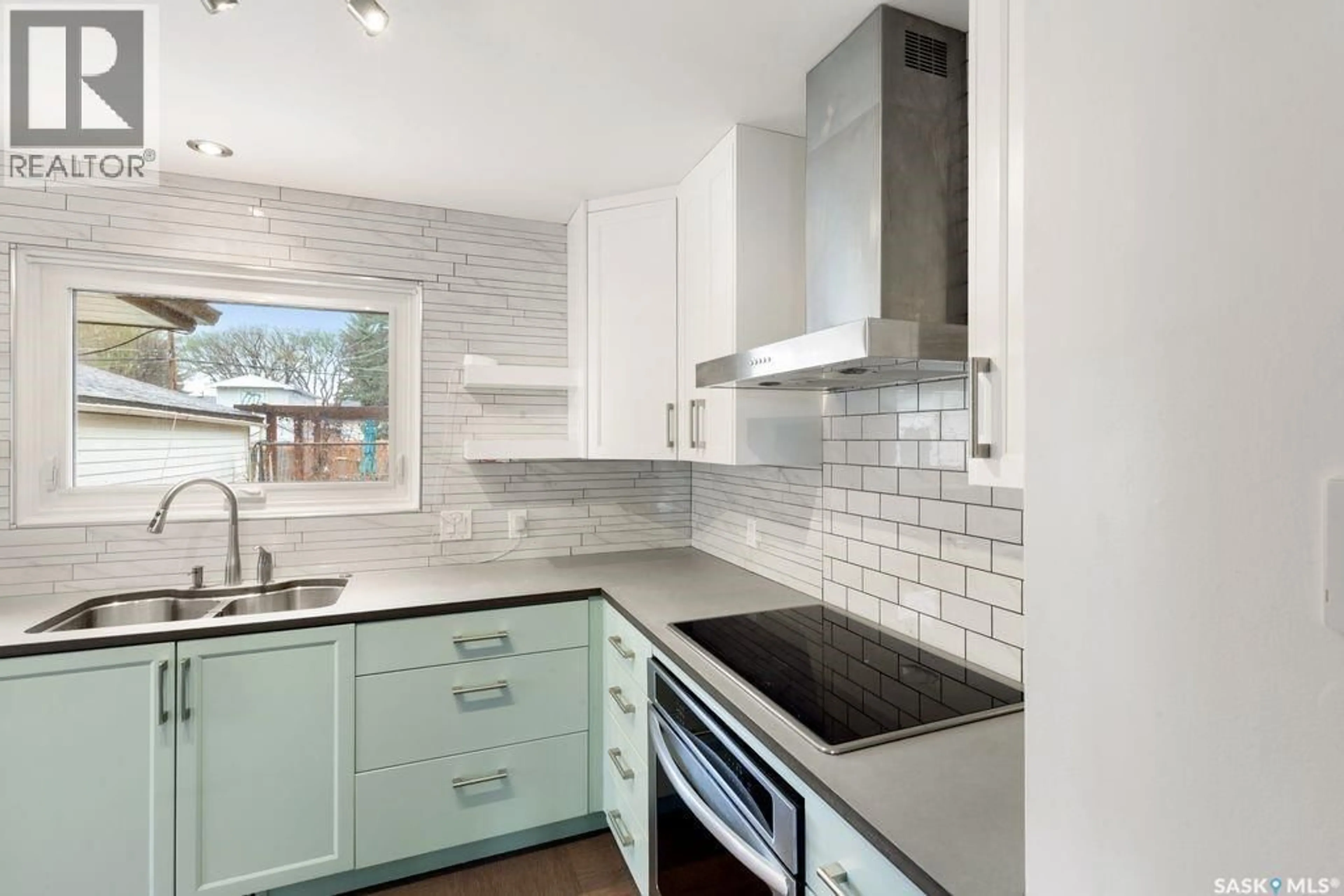 Contemporary kitchen, ceramic/tile floor for 1309 N AVENUE S, Saskatoon Saskatchewan S7M2R2