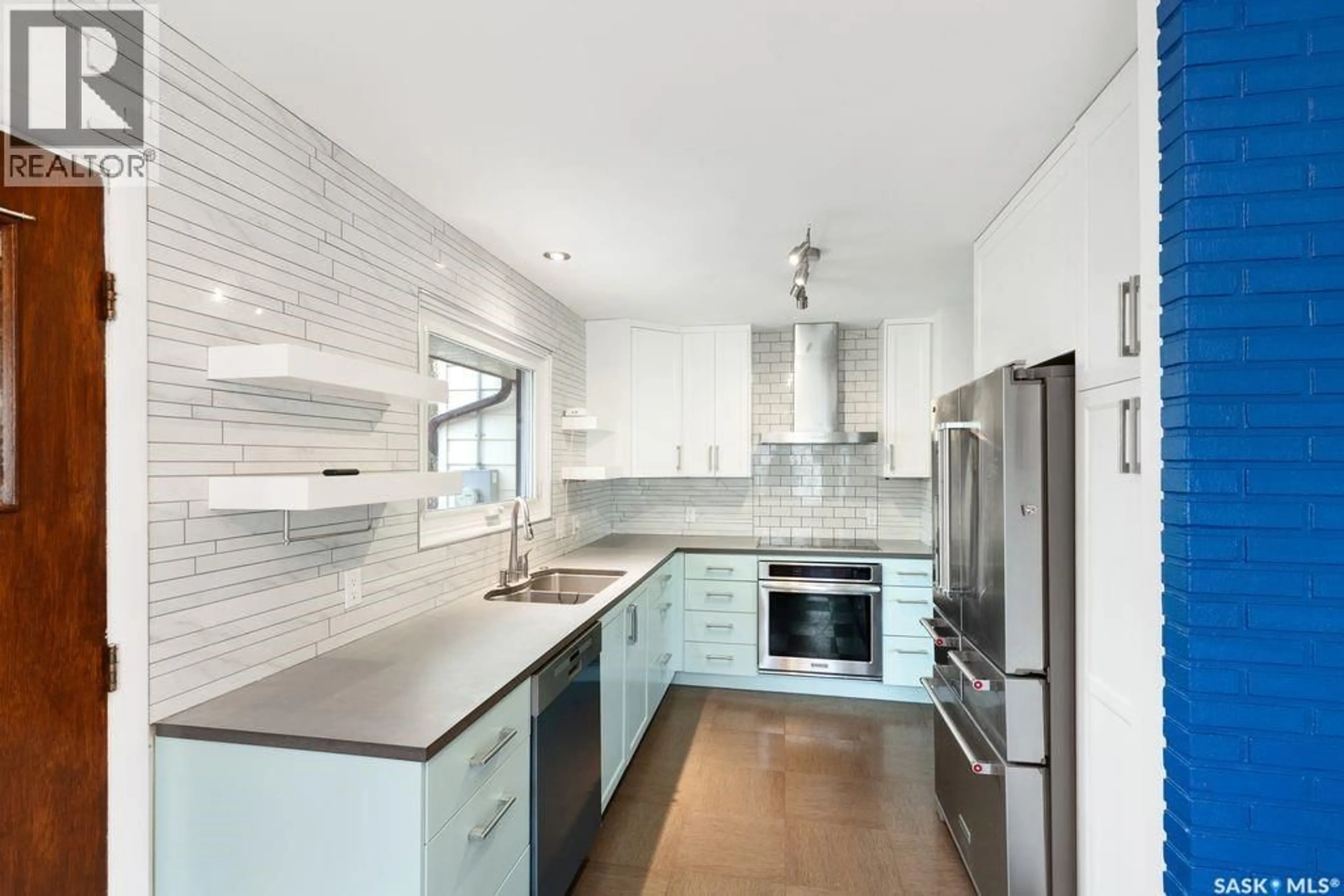 Contemporary kitchen, ceramic/tile floor for 1309 N AVENUE S, Saskatoon Saskatchewan S7M2R2