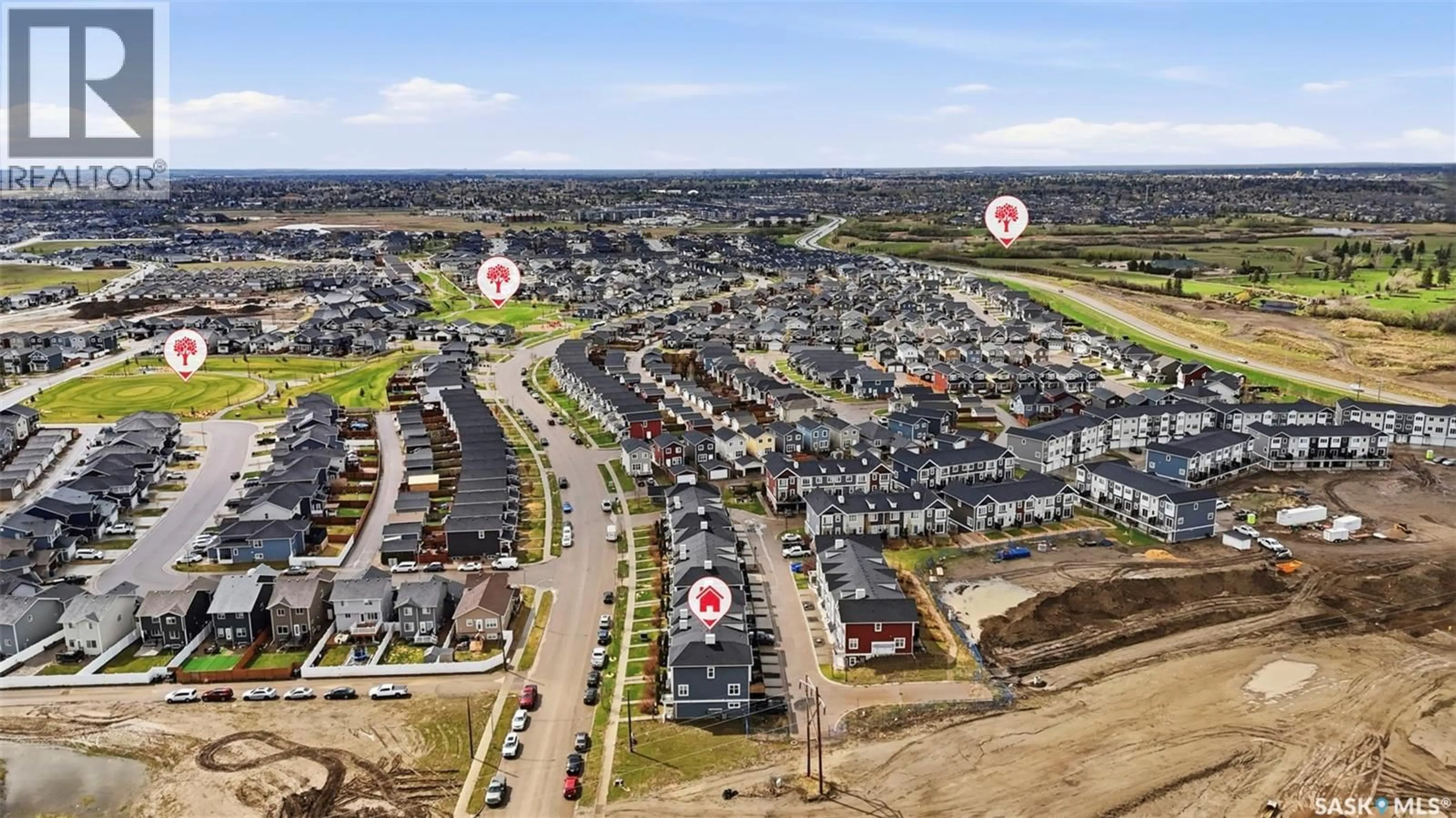 A pic from outside/outdoor area/front of a property/back of a property/a pic from drone, street for 737 MEADOWS BOULEVARD, Saskatoon Saskatchewan S7V0L3