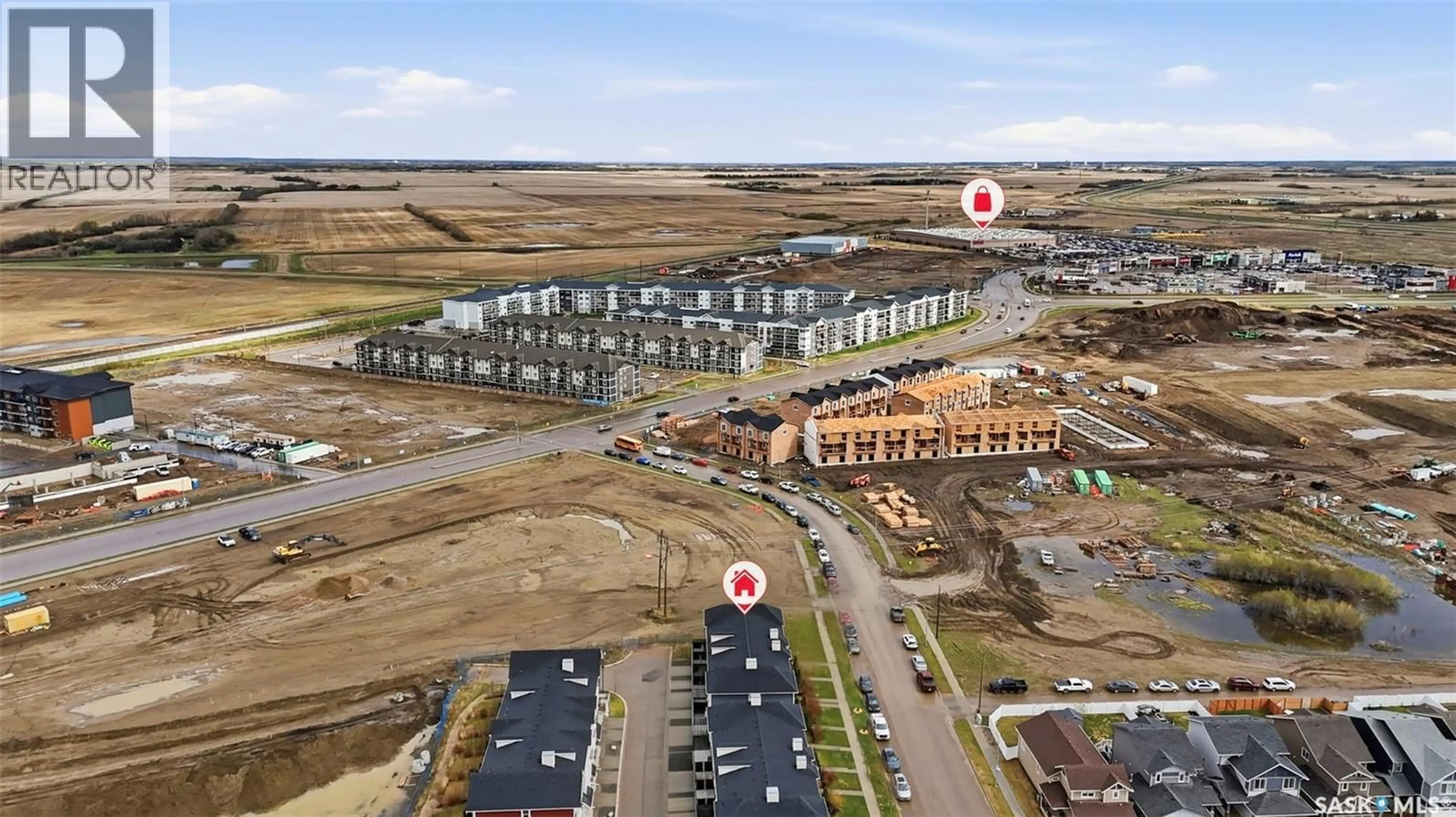 A pic from outside/outdoor area/front of a property/back of a property/a pic from drone, building for 737 MEADOWS BOULEVARD, Saskatoon Saskatchewan S7V0L3