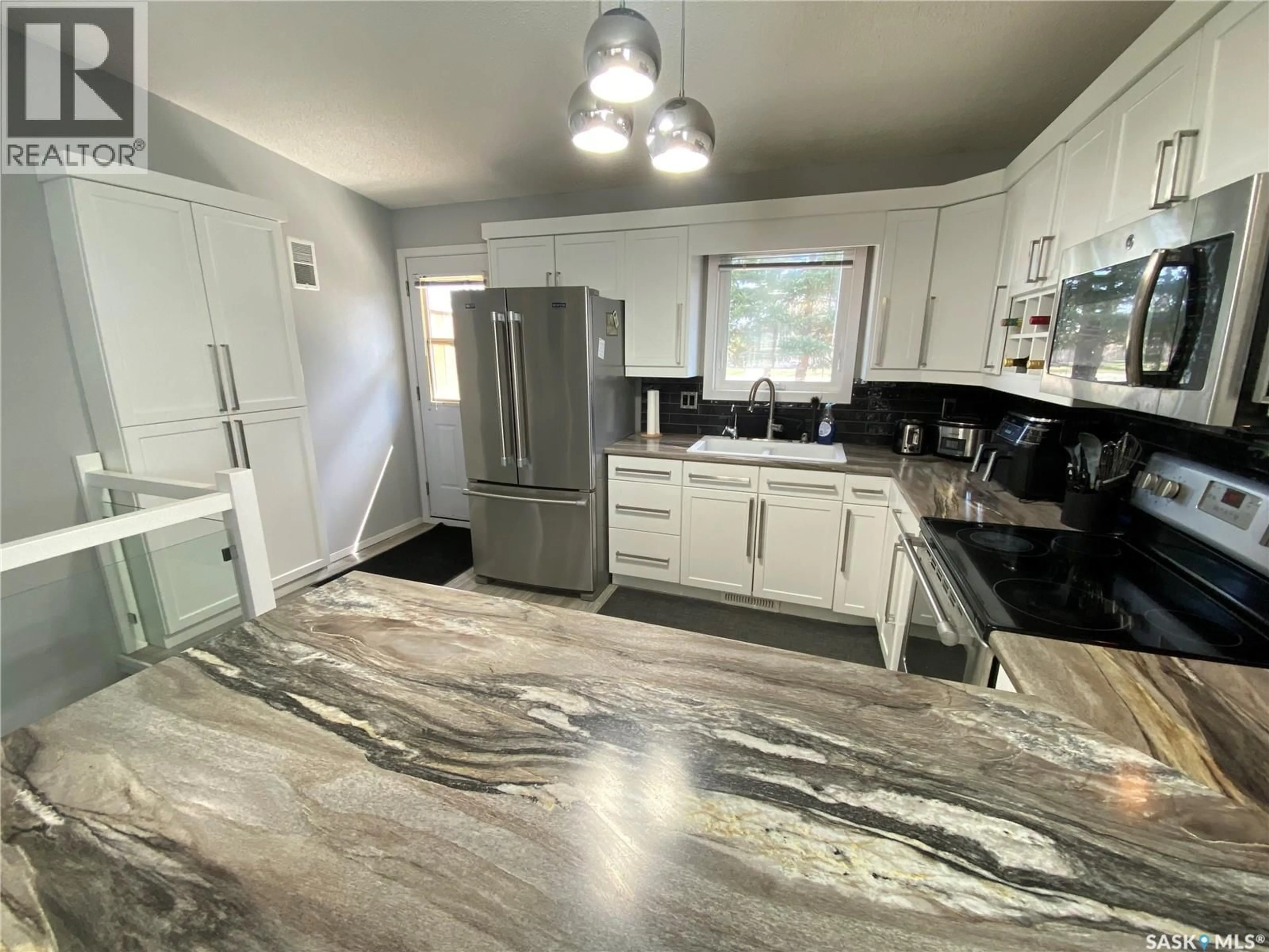 Open concept kitchen, ceramic/tile floor for 68 FENSON CRESCENT, Yorkton Saskatchewan S3N3S5