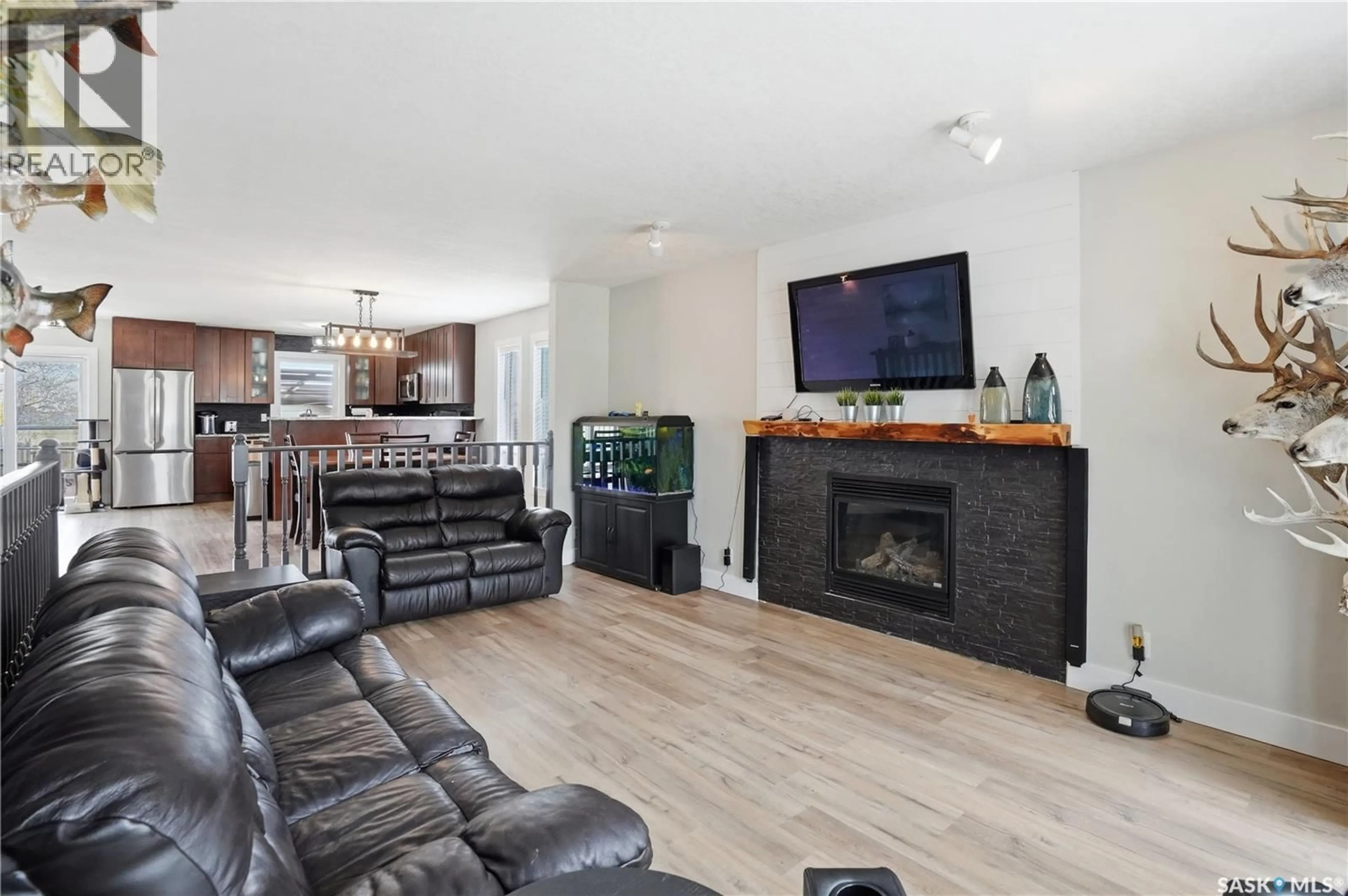 Living room with furniture, unknown for 165 3RD STREET, Pilot Butte Saskatchewan S0G3Z0