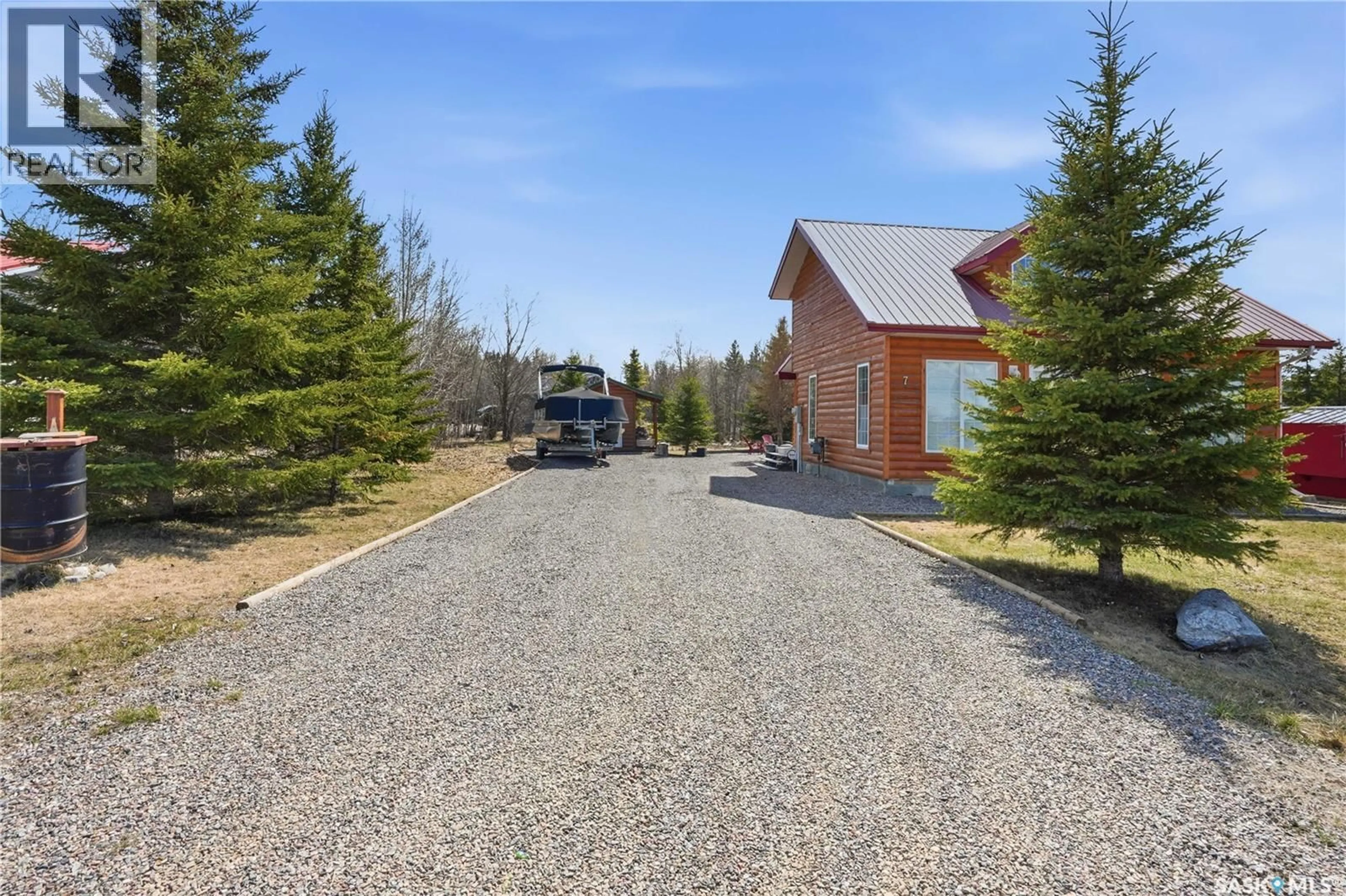 A pic from outside/outdoor area/front of a property/back of a property/a pic from drone, street for 7 PINE DRIVE, Candle Lake Saskatchewan S0J3E0