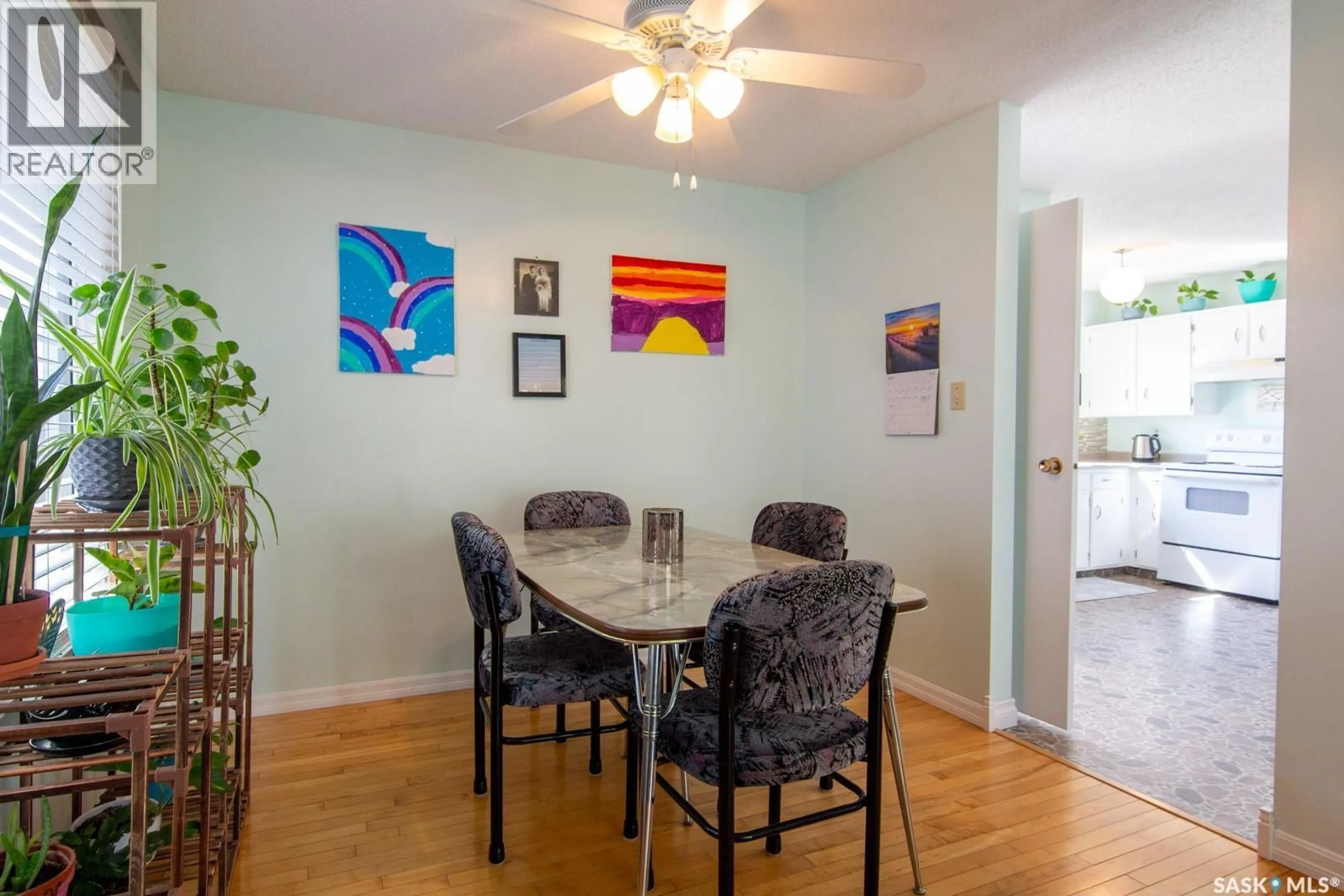 Dining room, wood/laminate floor for 127 DEVONSHIRE CRESCENT, Saskatoon Saskatchewan S7L5V6
