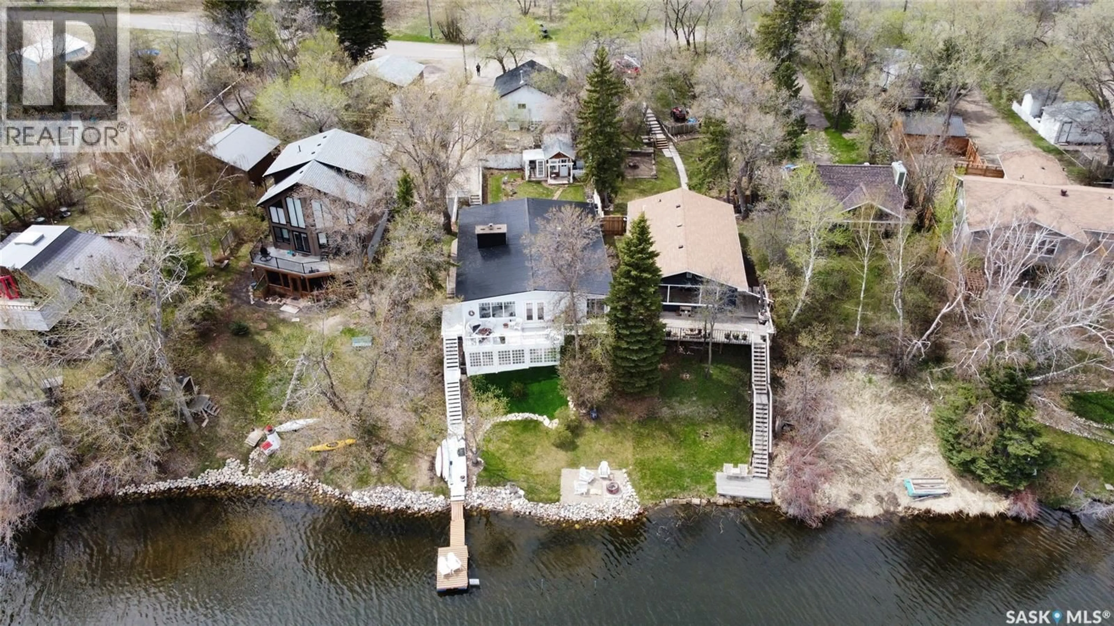 A pic from outside/outdoor area/front of a property/back of a property/a pic from drone, water/lake/river/ocean view for 8 LAKESIDE DRIVE, Pike Lake Provincial Park Saskatchewan S7K1N2