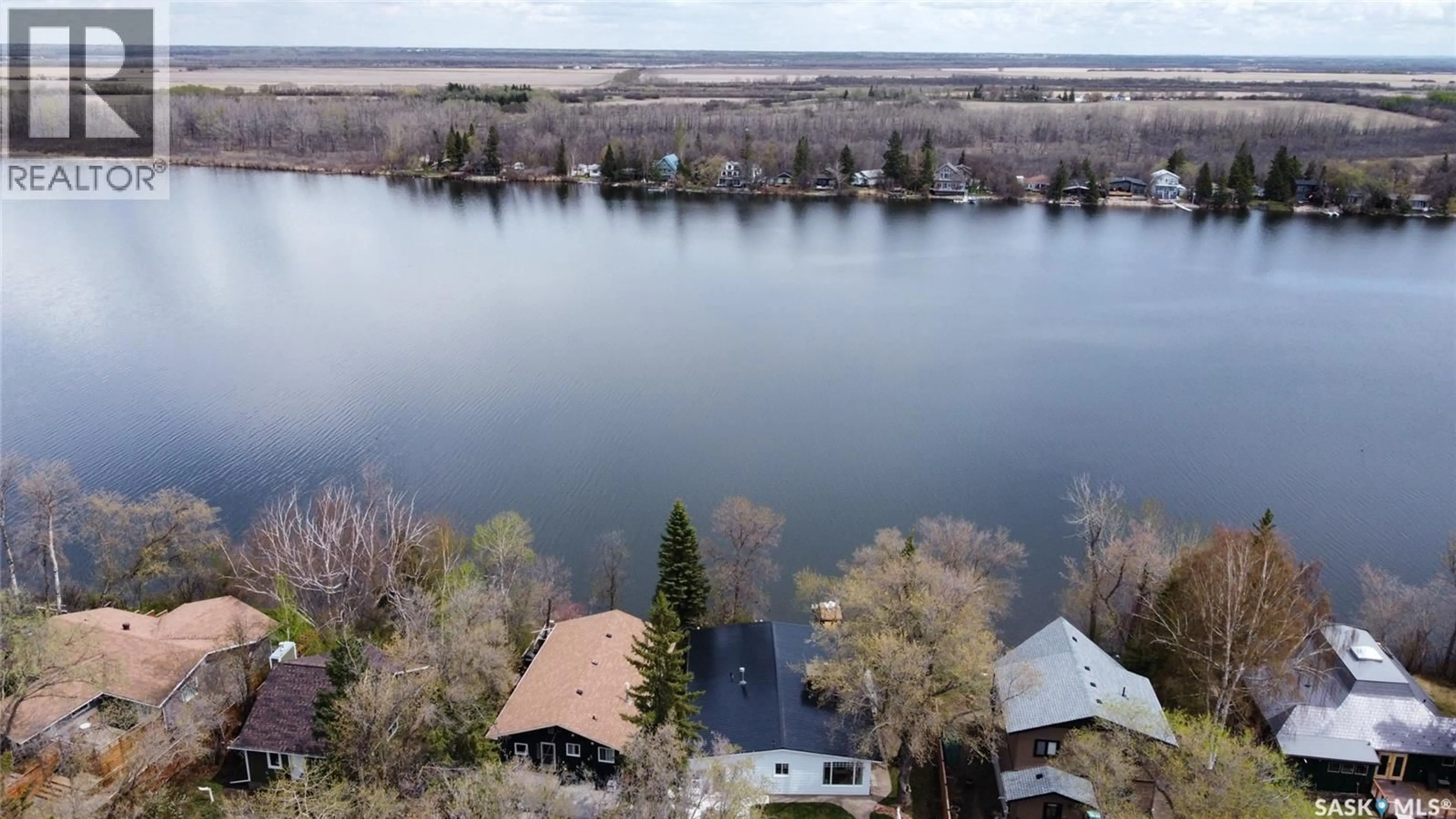 A pic from outside/outdoor area/front of a property/back of a property/a pic from drone, water/lake/river/ocean view for 8 LAKESIDE DRIVE, Pike Lake Provincial Park Saskatchewan S7K1N2