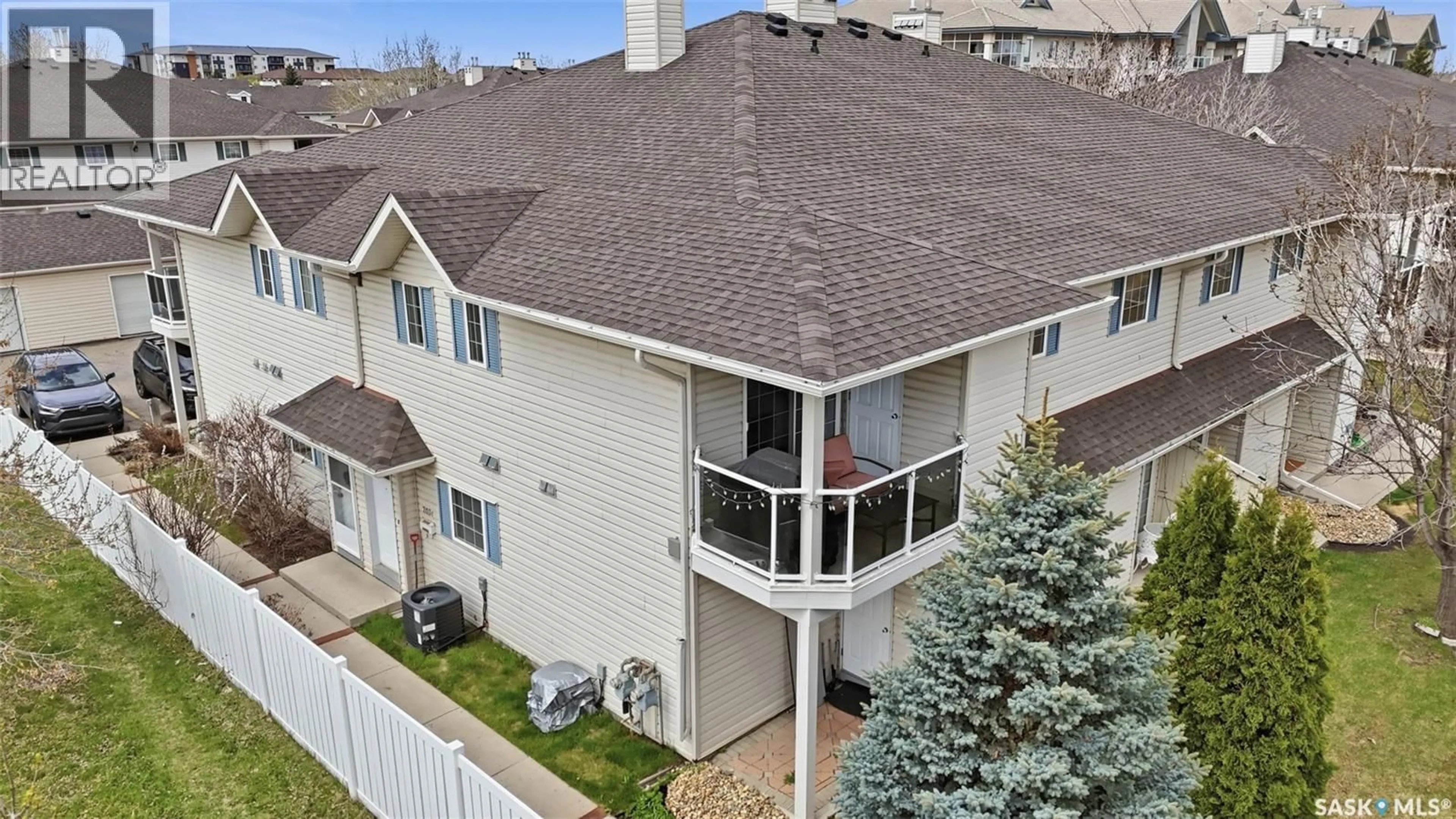 A pic from outside/outdoor area/front of a property/back of a property/a pic from drone, unknown for 203C - 425 KEEVIL CRESCENT, Saskatoon Saskatchewan S7N4R9