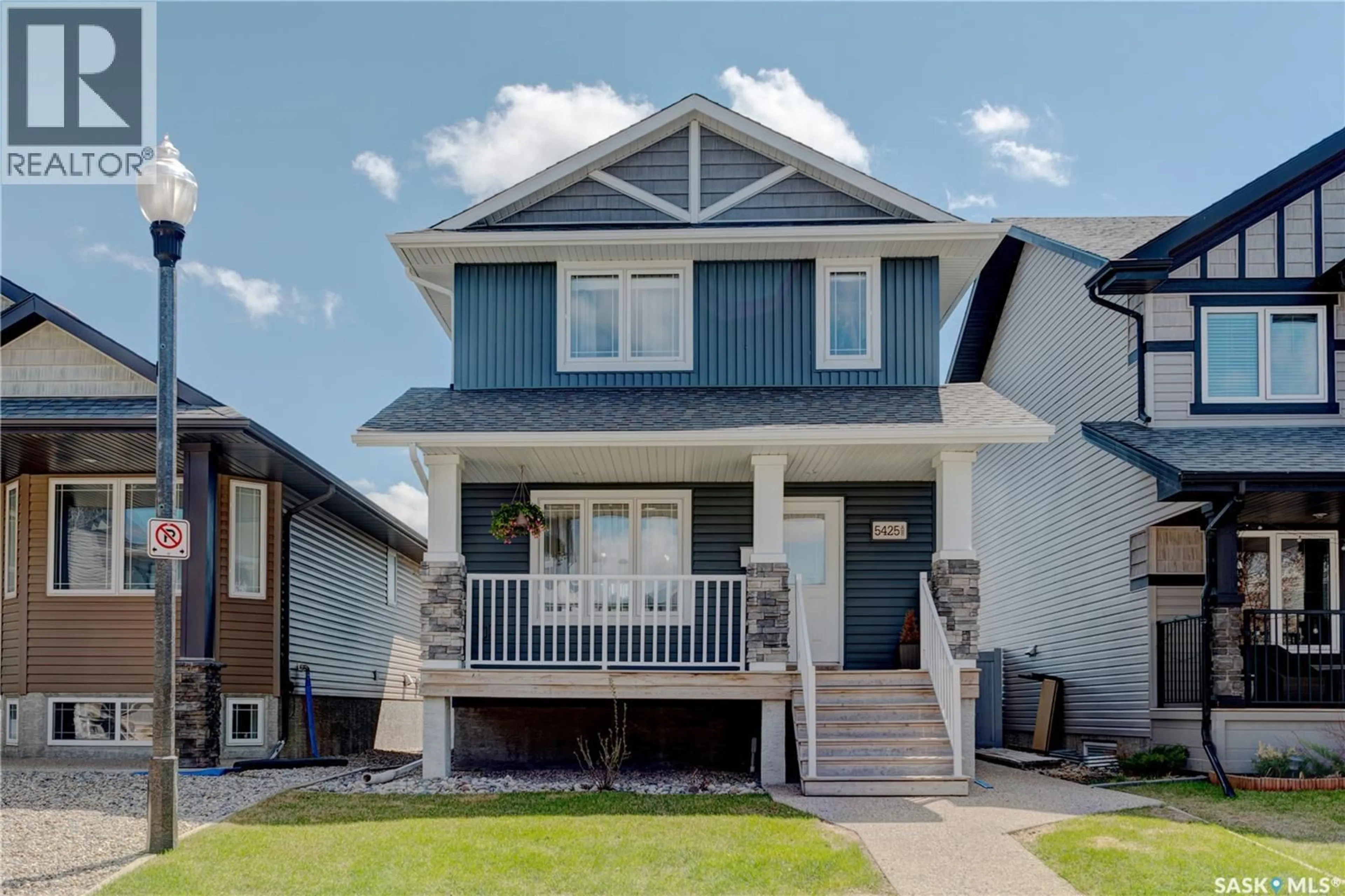 Home with vinyl exterior material, street for 5425 MCCLELLAND DRIVE, Regina Saskatchewan S4W0K8