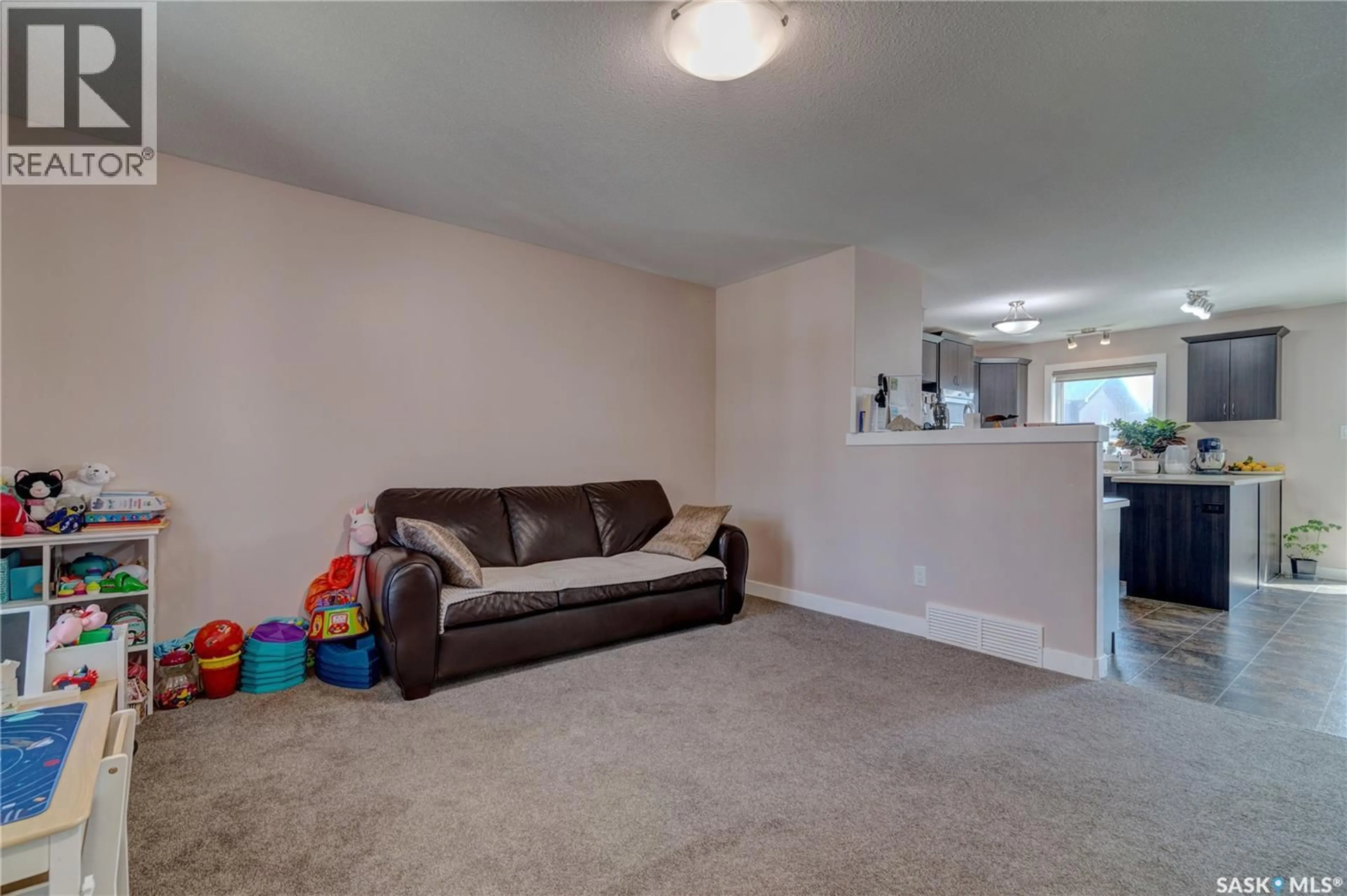 Living room with furniture, unknown for 5425 MCCLELLAND DRIVE, Regina Saskatchewan S4W0K8