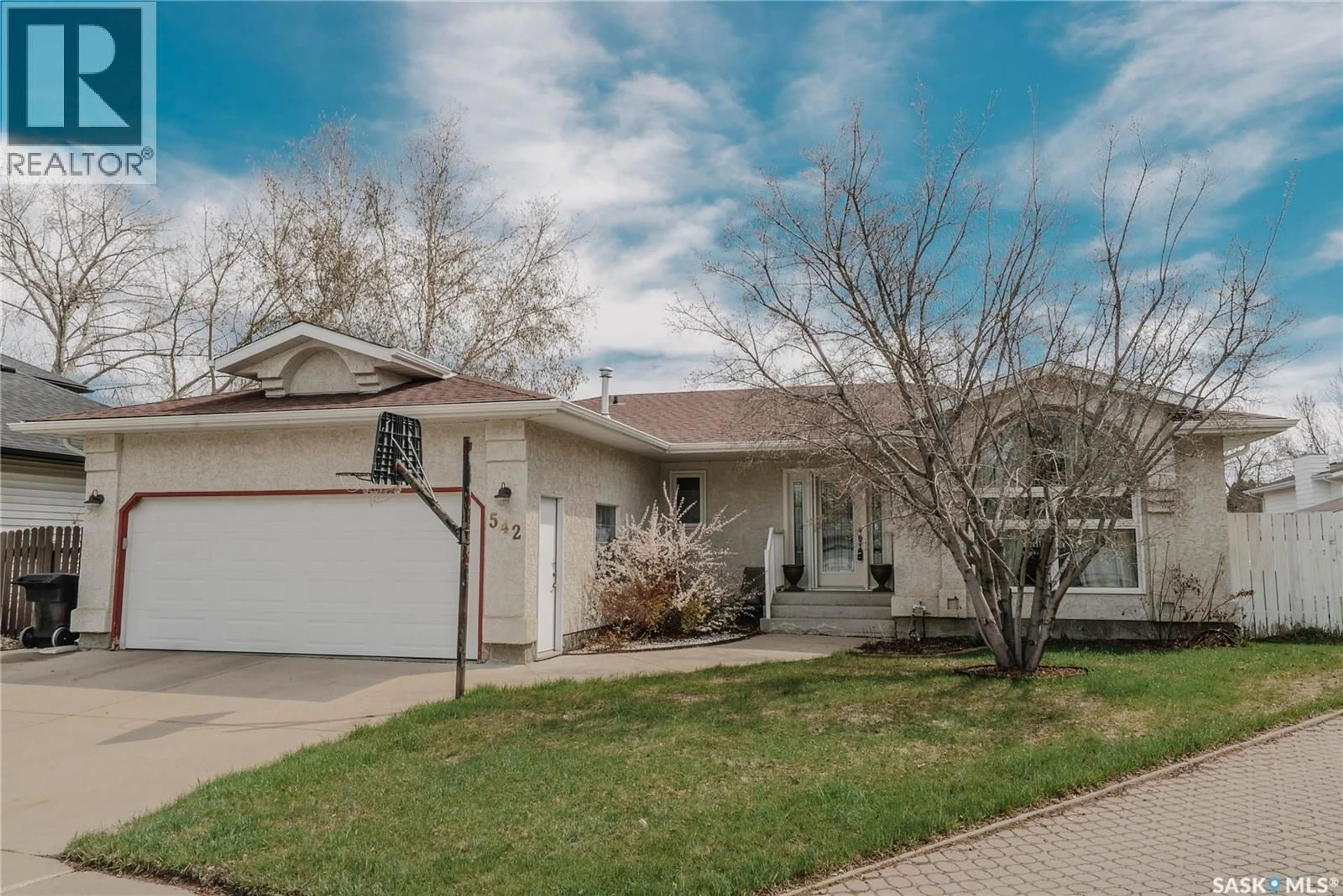 Home with vinyl exterior material, street for 542 BORNSTEIN TERRACE, Saskatoon Saskatchewan S7N3Y1