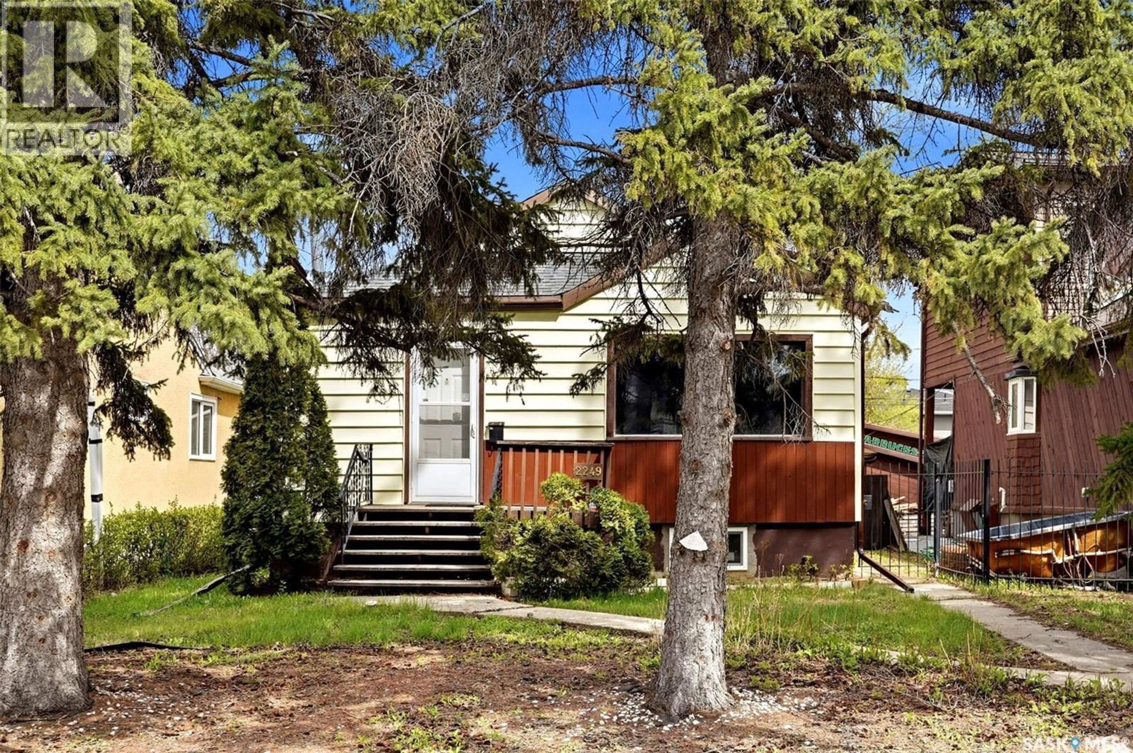 Home with vinyl exterior material, street for 2249 ATKINSON STREET, Regina Saskatchewan S4N3X2