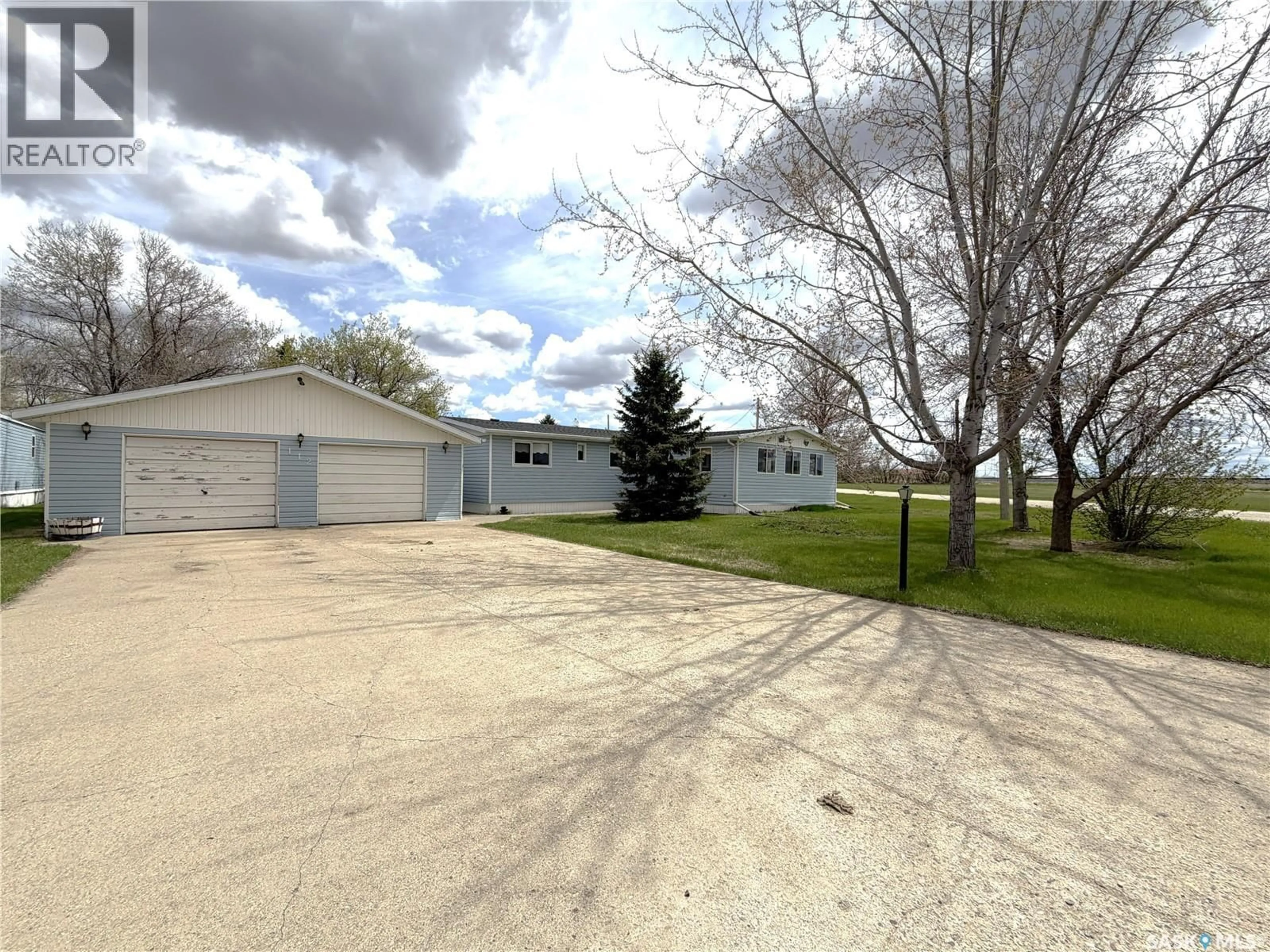 A pic from outside/outdoor area/front of a property/back of a property/a pic from drone, street for 1016 RAILWAY AVENUE, Milestone Saskatchewan S0G3L0