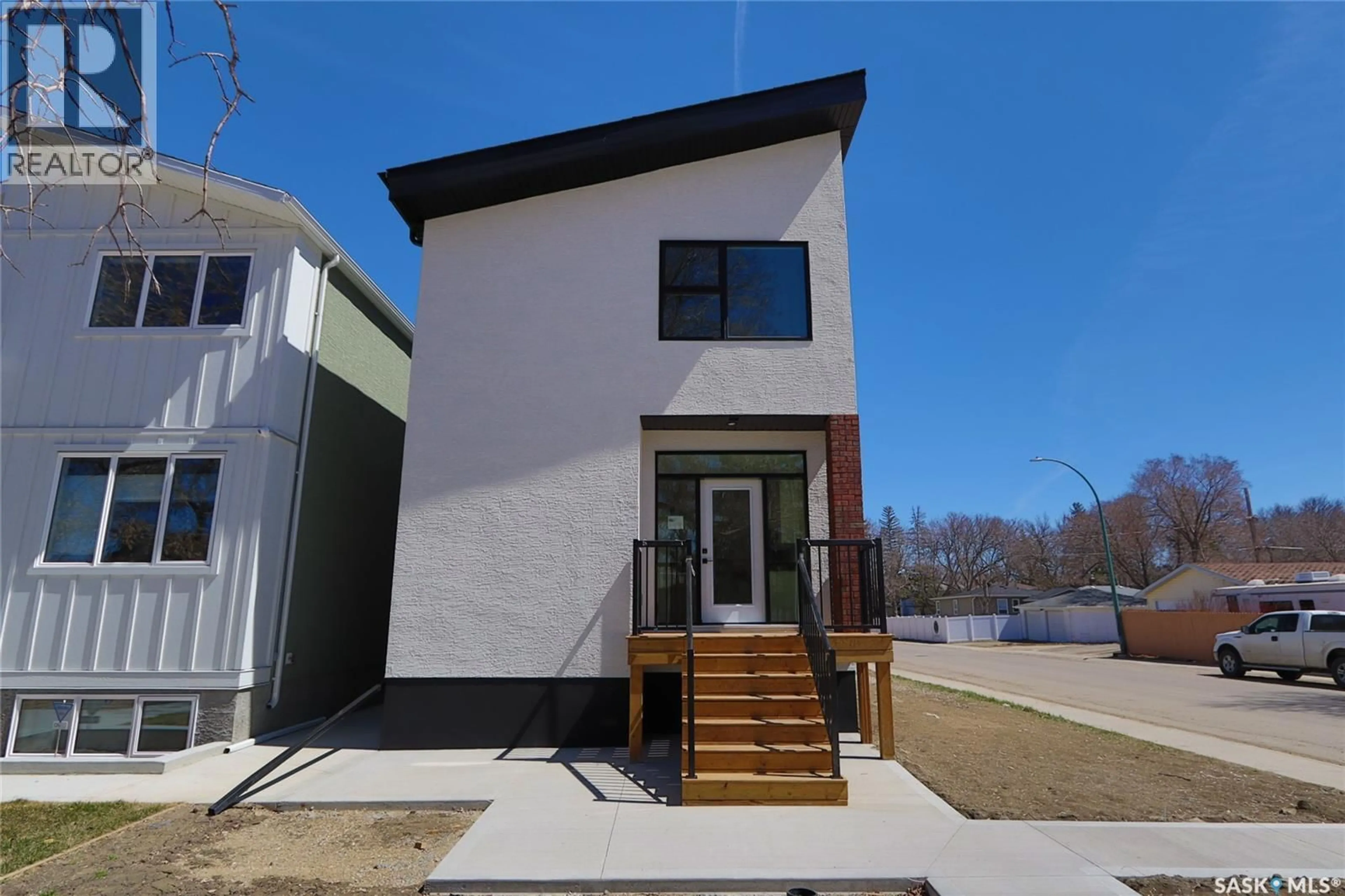 Home with brick exterior material, street for 2475 MCARA STREET, Regina Saskatchewan S4N2W6