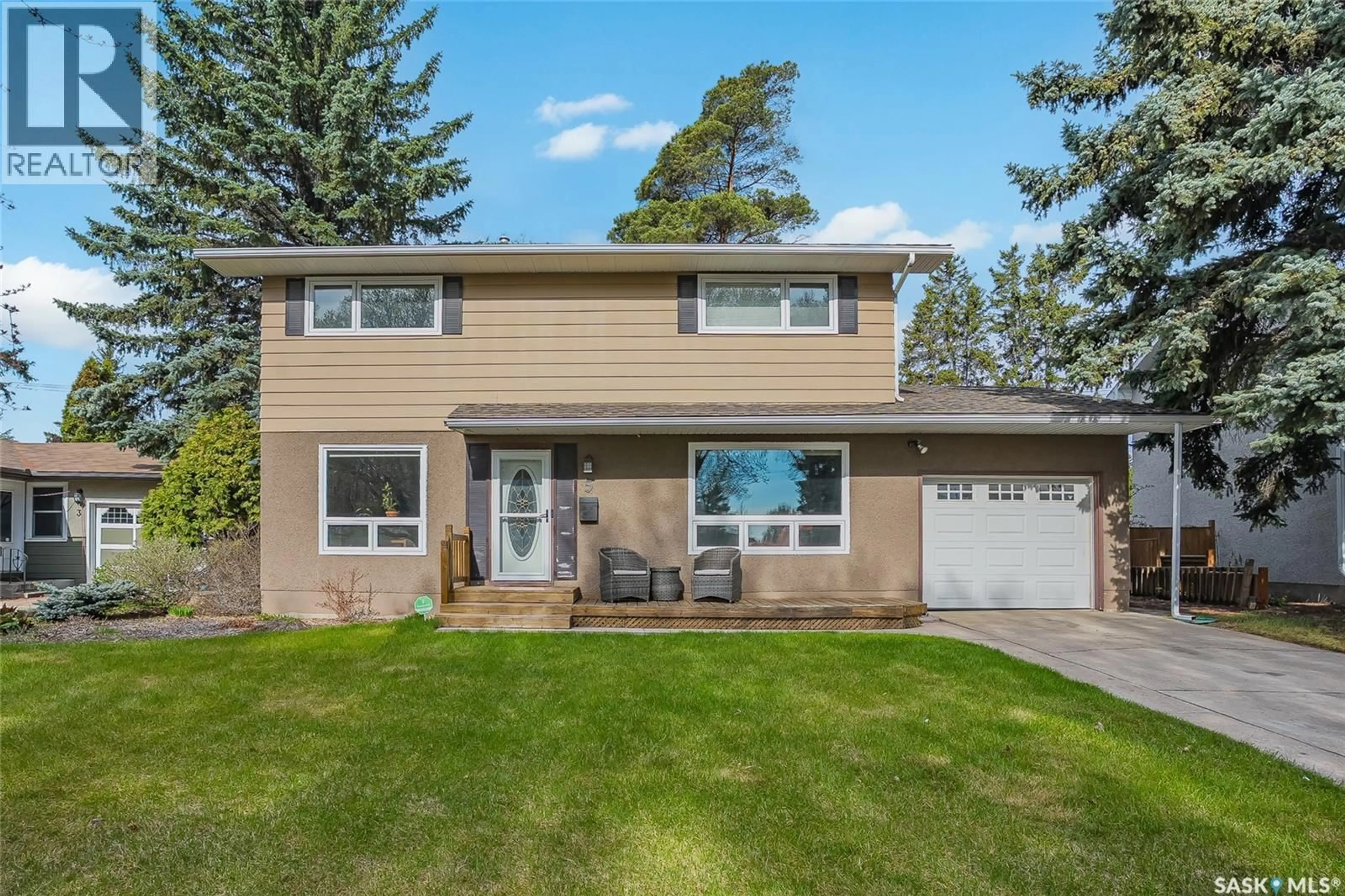 Home with vinyl exterior material, street for 5 LEYDEN CRESCENT, Saskatoon Saskatchewan S7J2S3