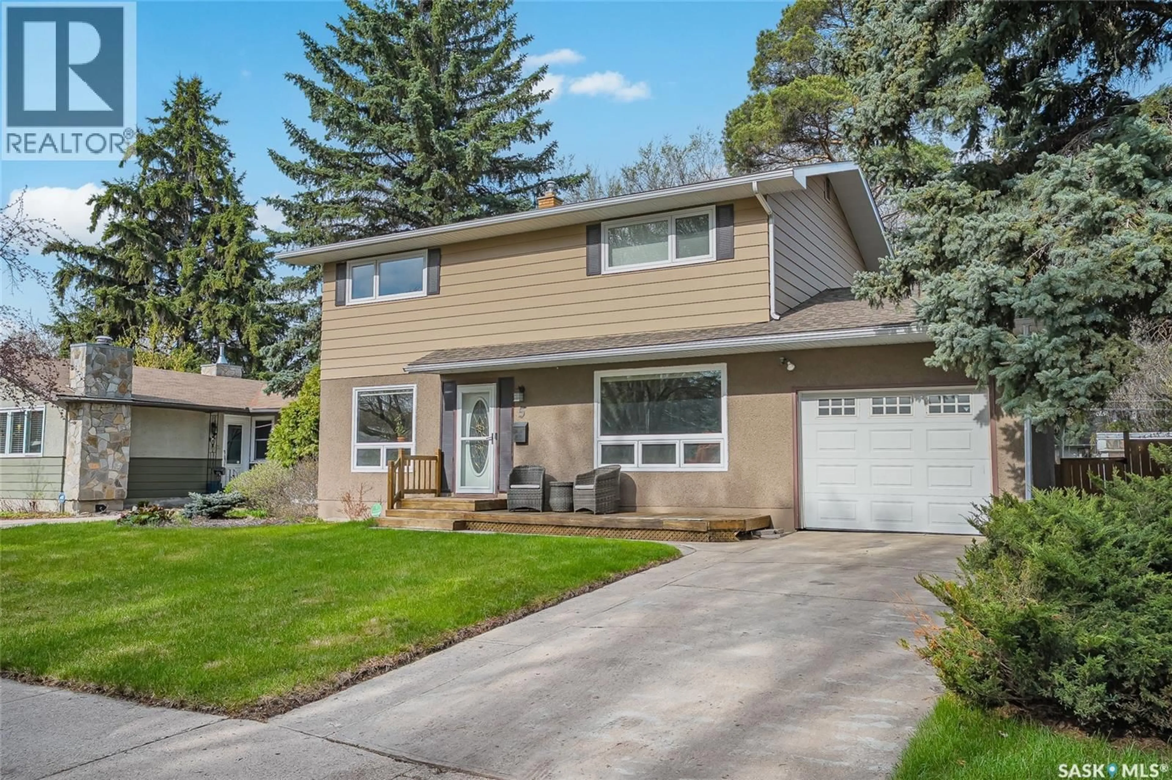 Home with vinyl exterior material, street for 5 LEYDEN CRESCENT, Saskatoon Saskatchewan S7J2S3
