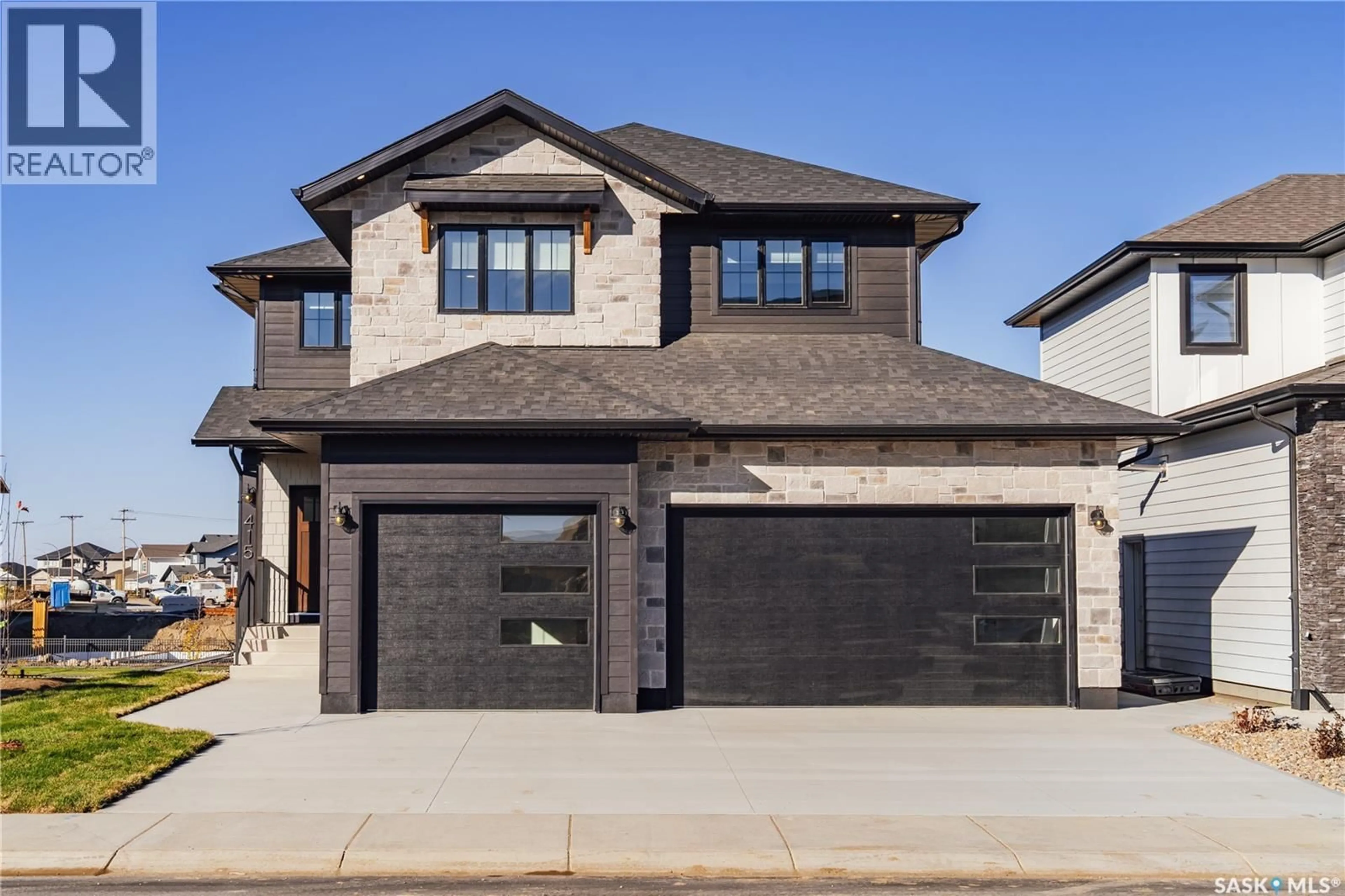 Home with brick exterior material, street for 415 SHARMA CRESCENT, Saskatoon Saskatchewan S7W1K8