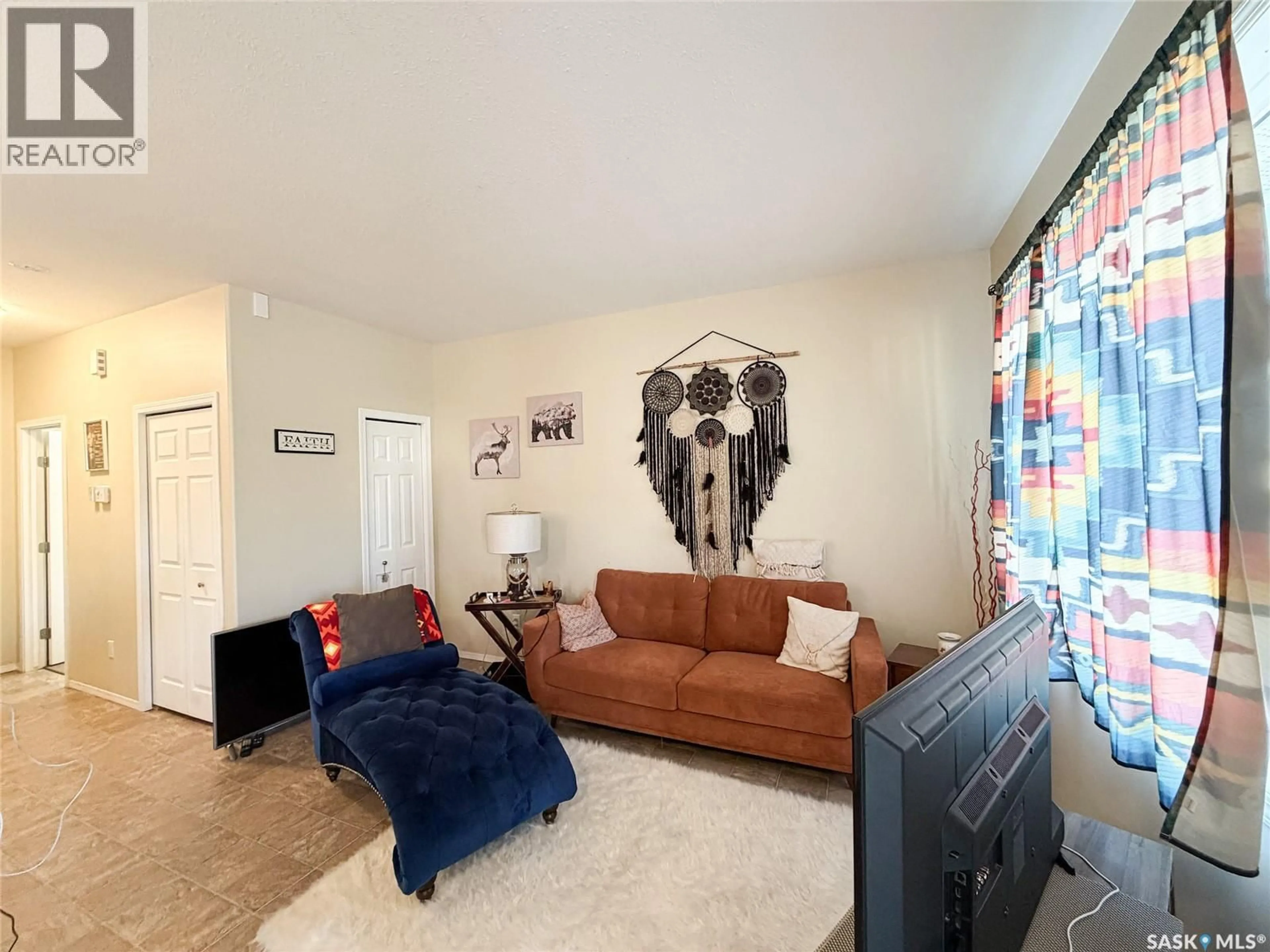 Living room with furniture, unknown for 215 2ND STREET, Meadow Lake Saskatchewan S9X1C7